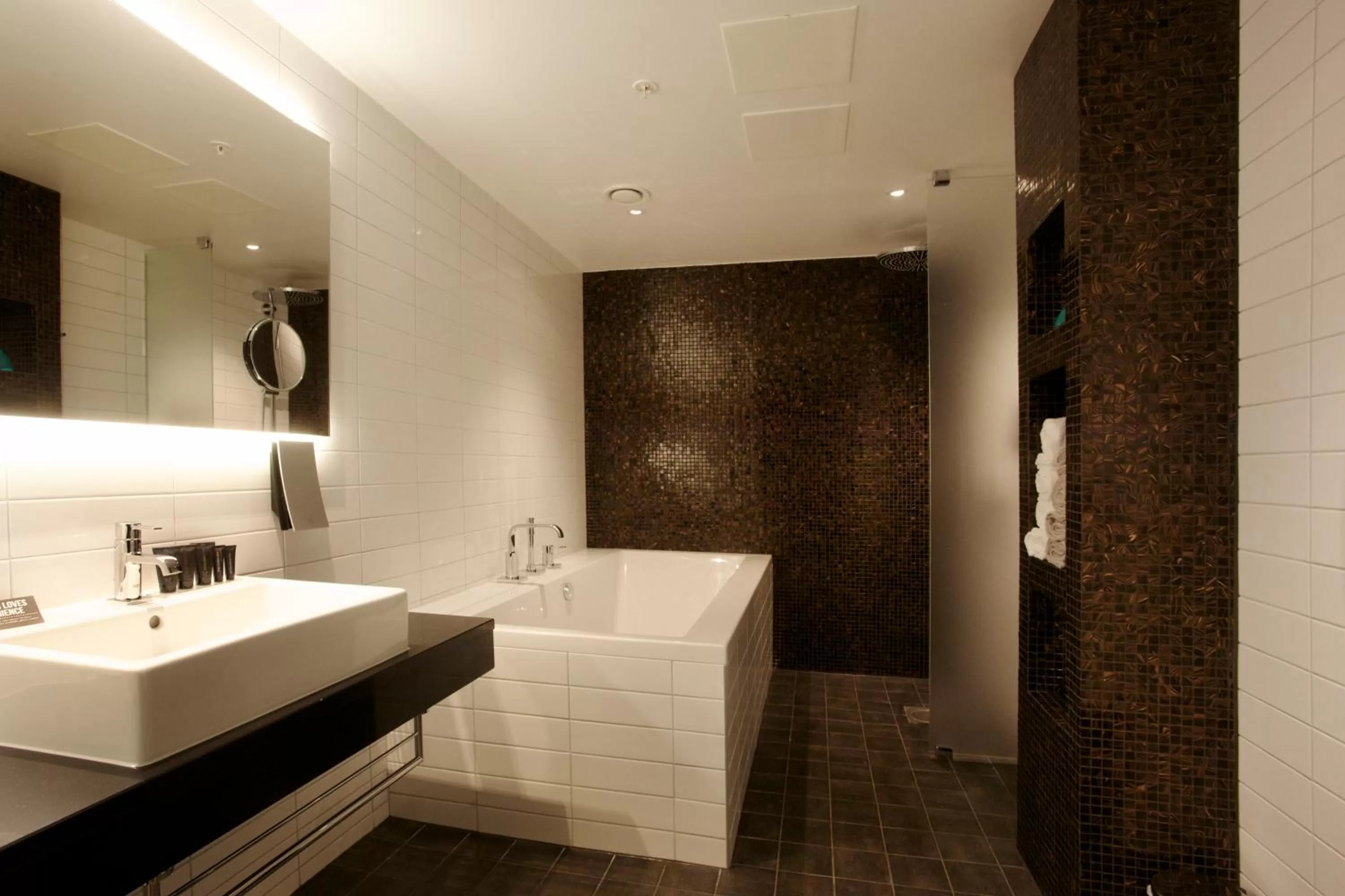 Bathroom, Bed in Clarion Hotel Sense