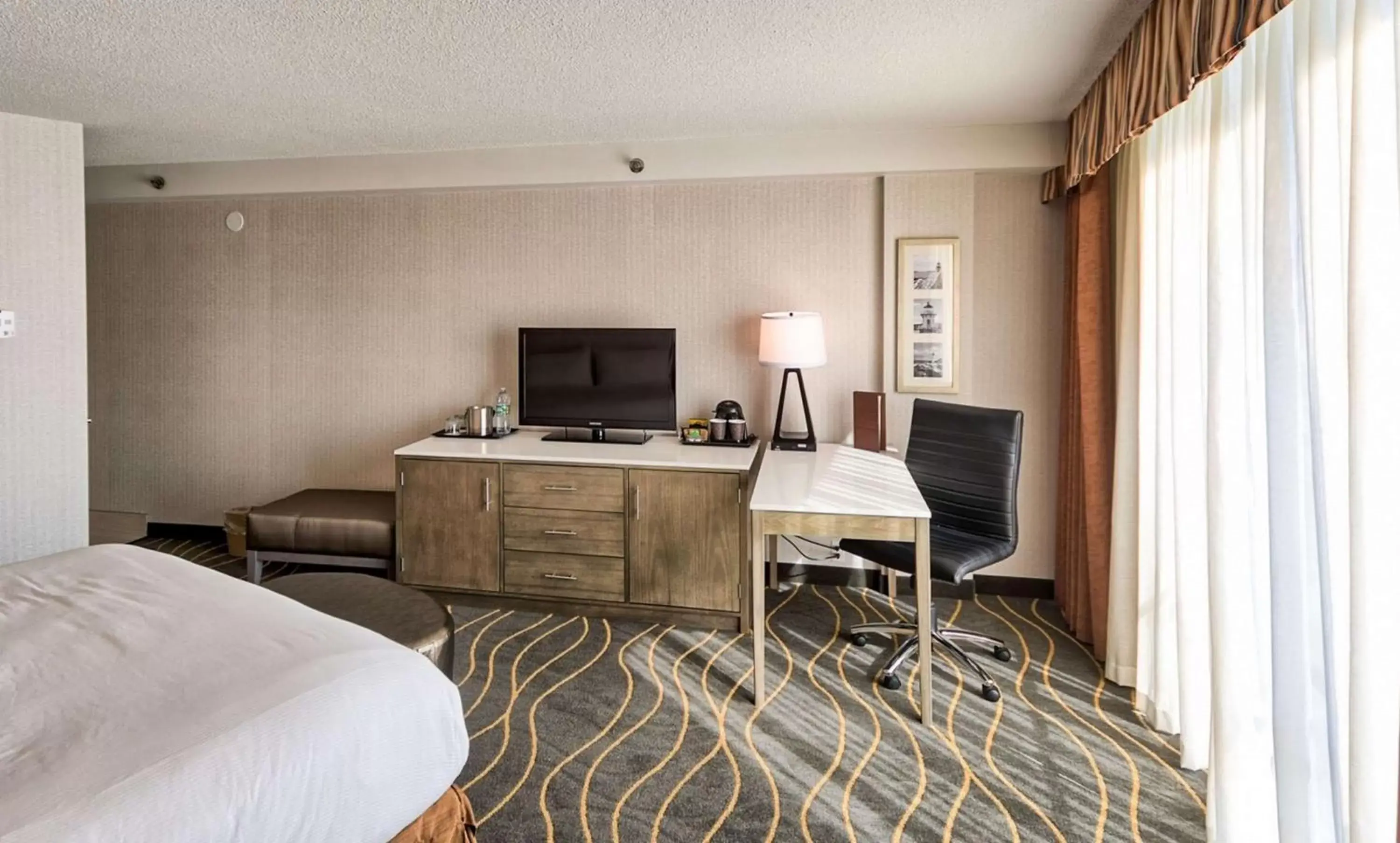 Bed, TV/Entertainment Center in DoubleTree by Hilton Portland, ME