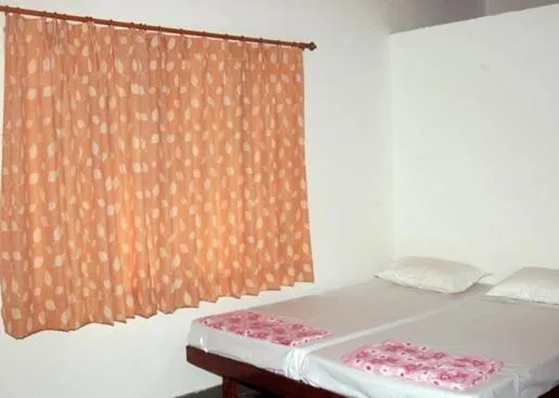 Bed in Udai Haveli Guest House