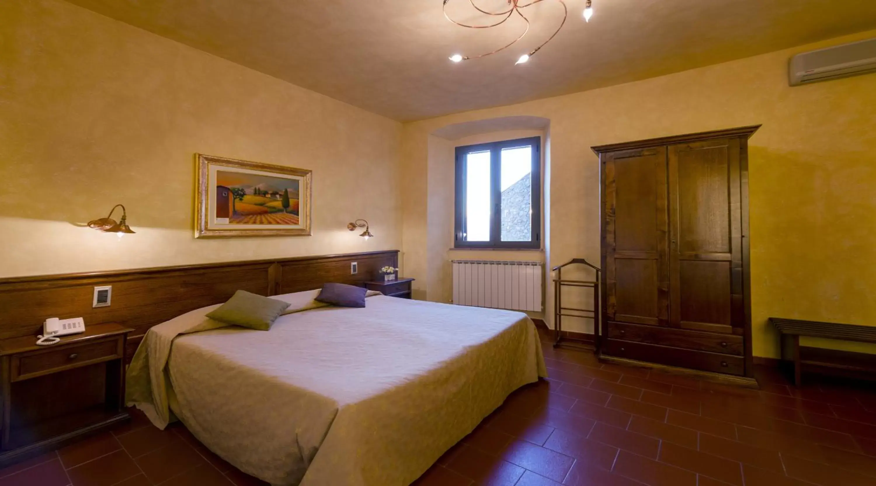 Photo of the whole room, Bed in Hotel Italia Cortona