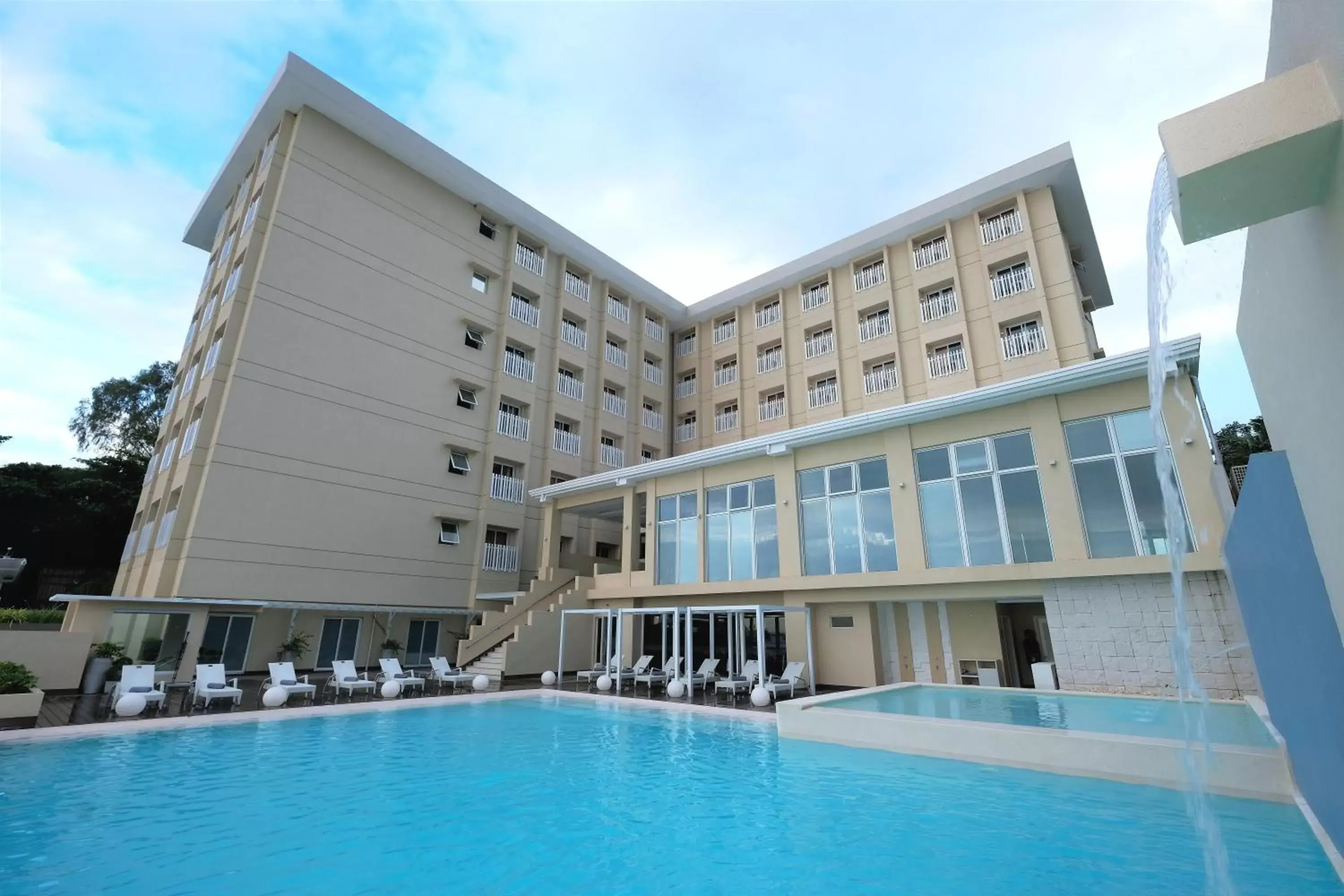 Swimming pool, Property Building in BE Resort Mactan