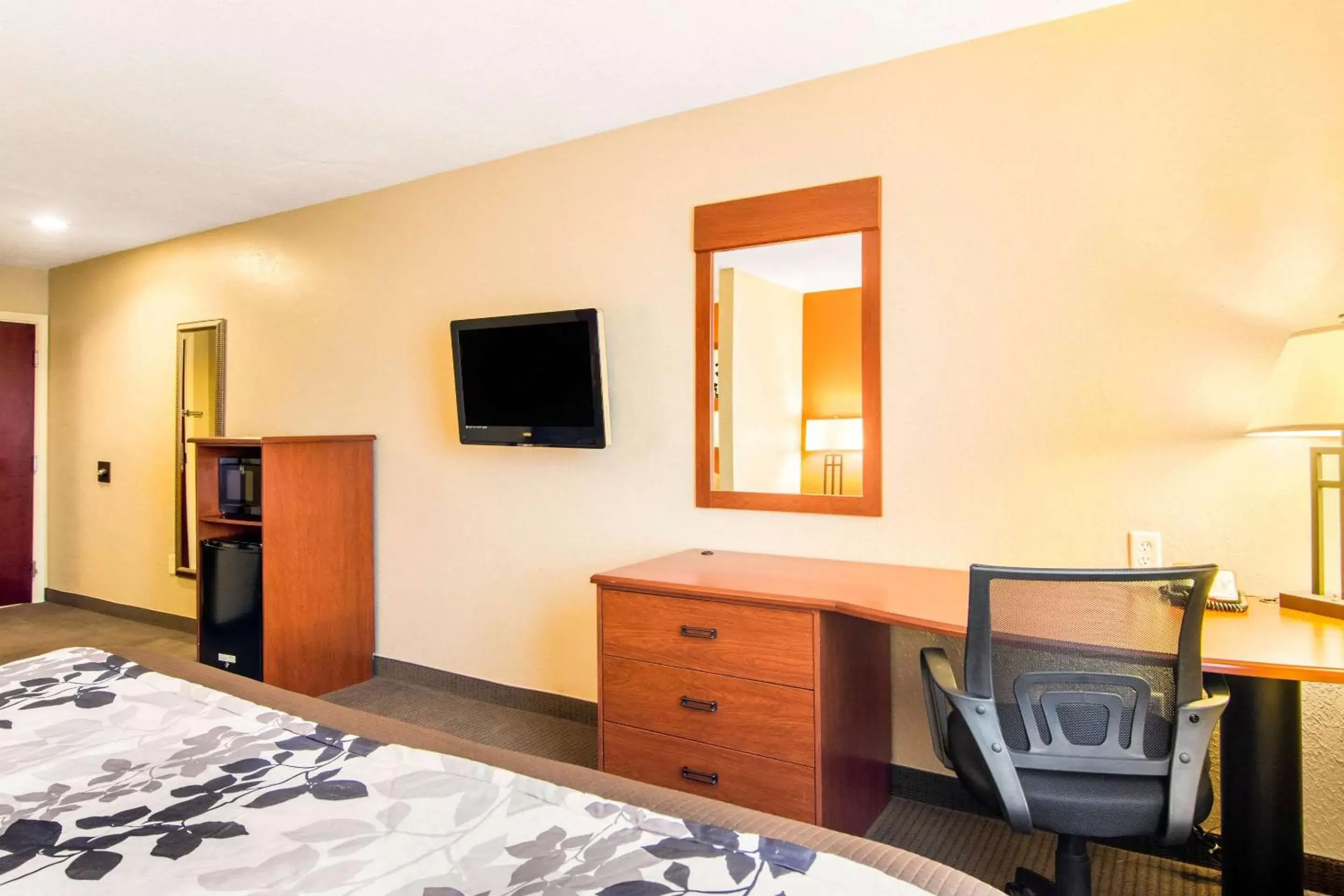 Photo of the whole room, TV/Entertainment Center in Sleep Inn & Suites