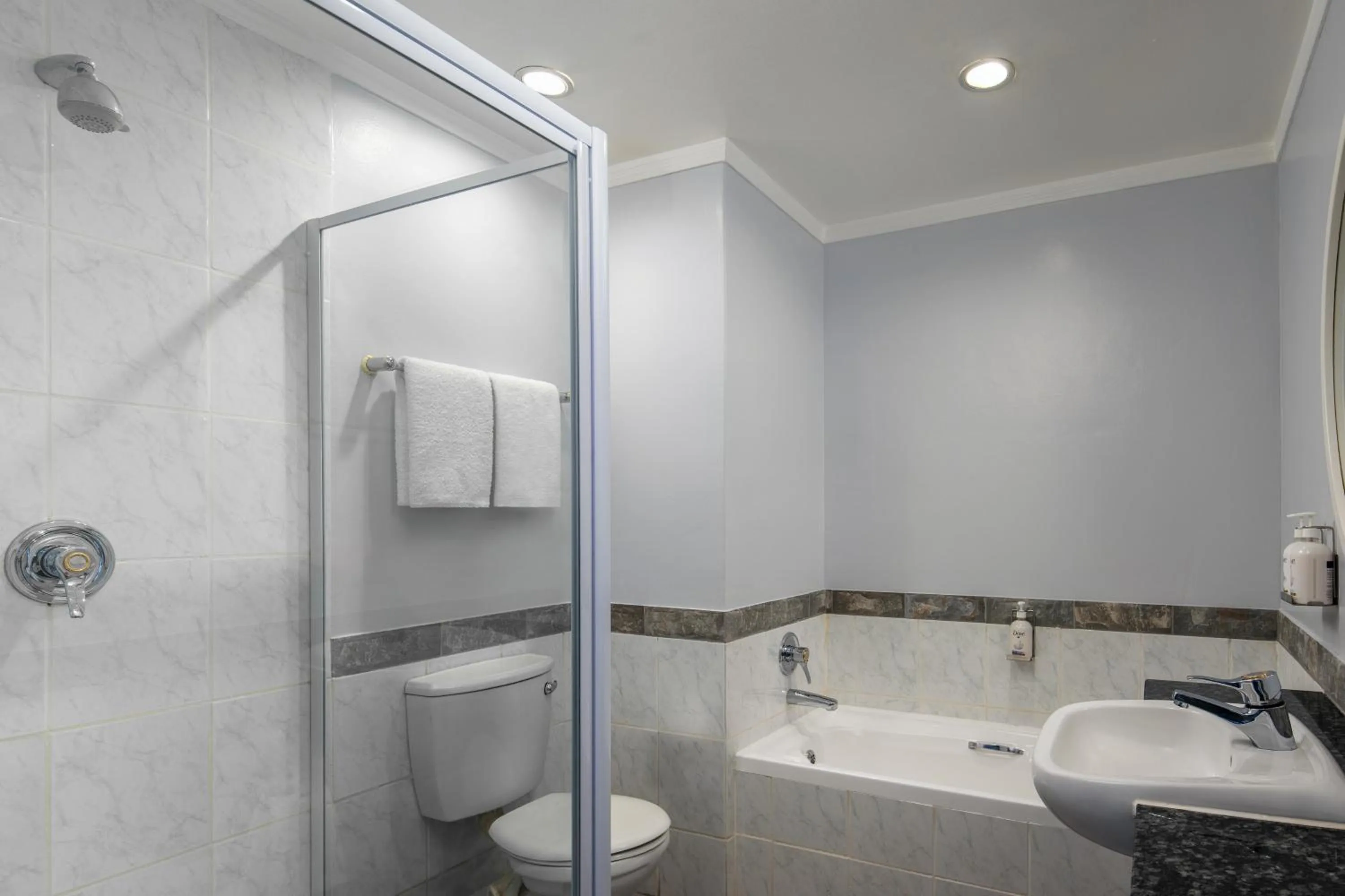 Bathroom in Holiday Inn Johannesburg OR Tambo Airport Hotel by IHG
