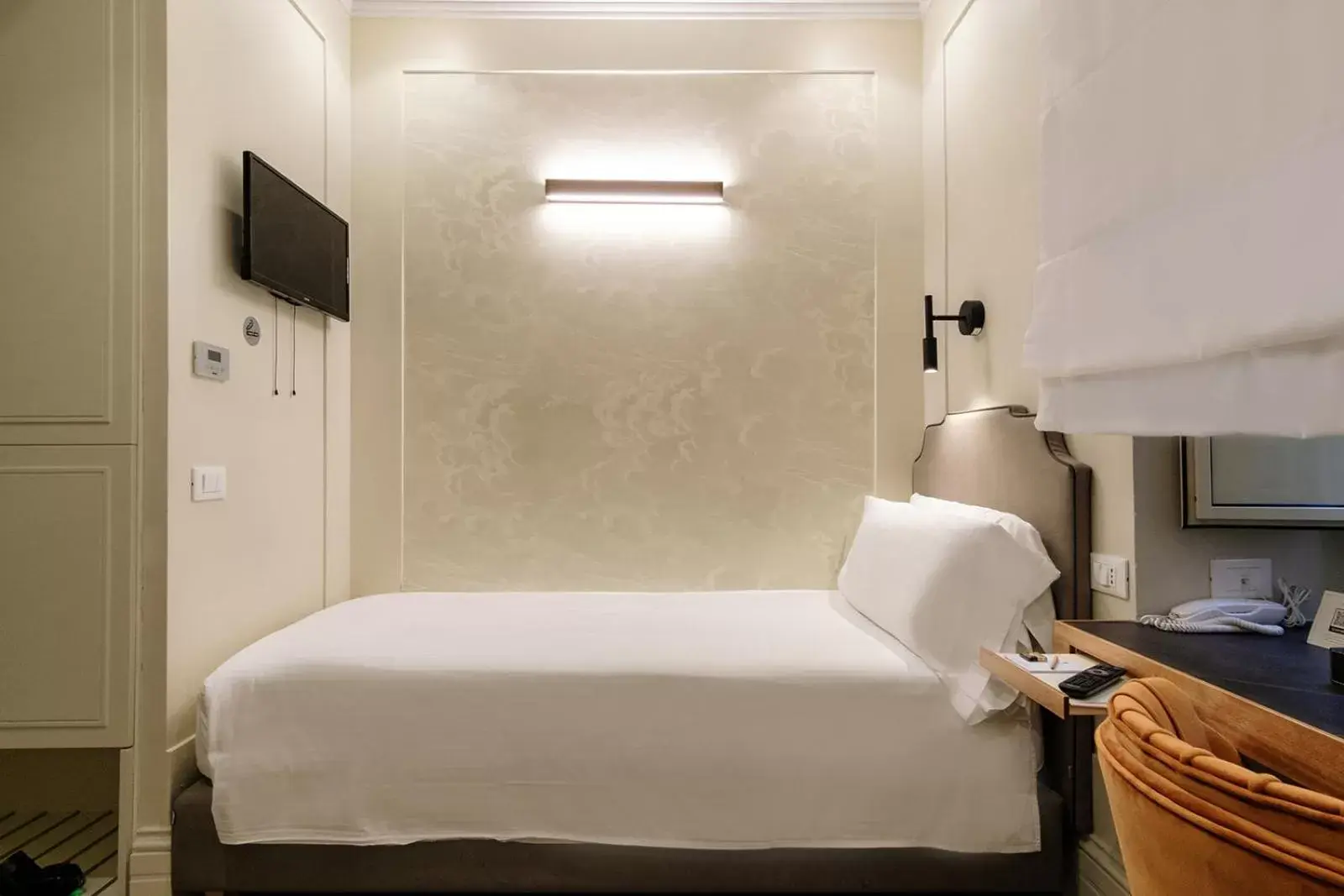 Bed in Hotel Smeraldo Bed in Hotel Smeraldo