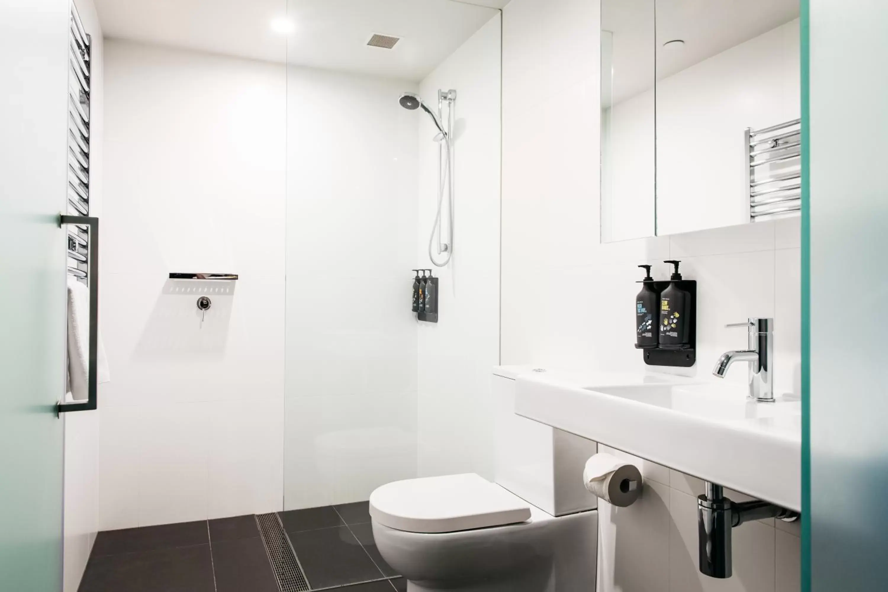 Shower, Bathroom in Nishi Apartments Eco Living by Ovolo