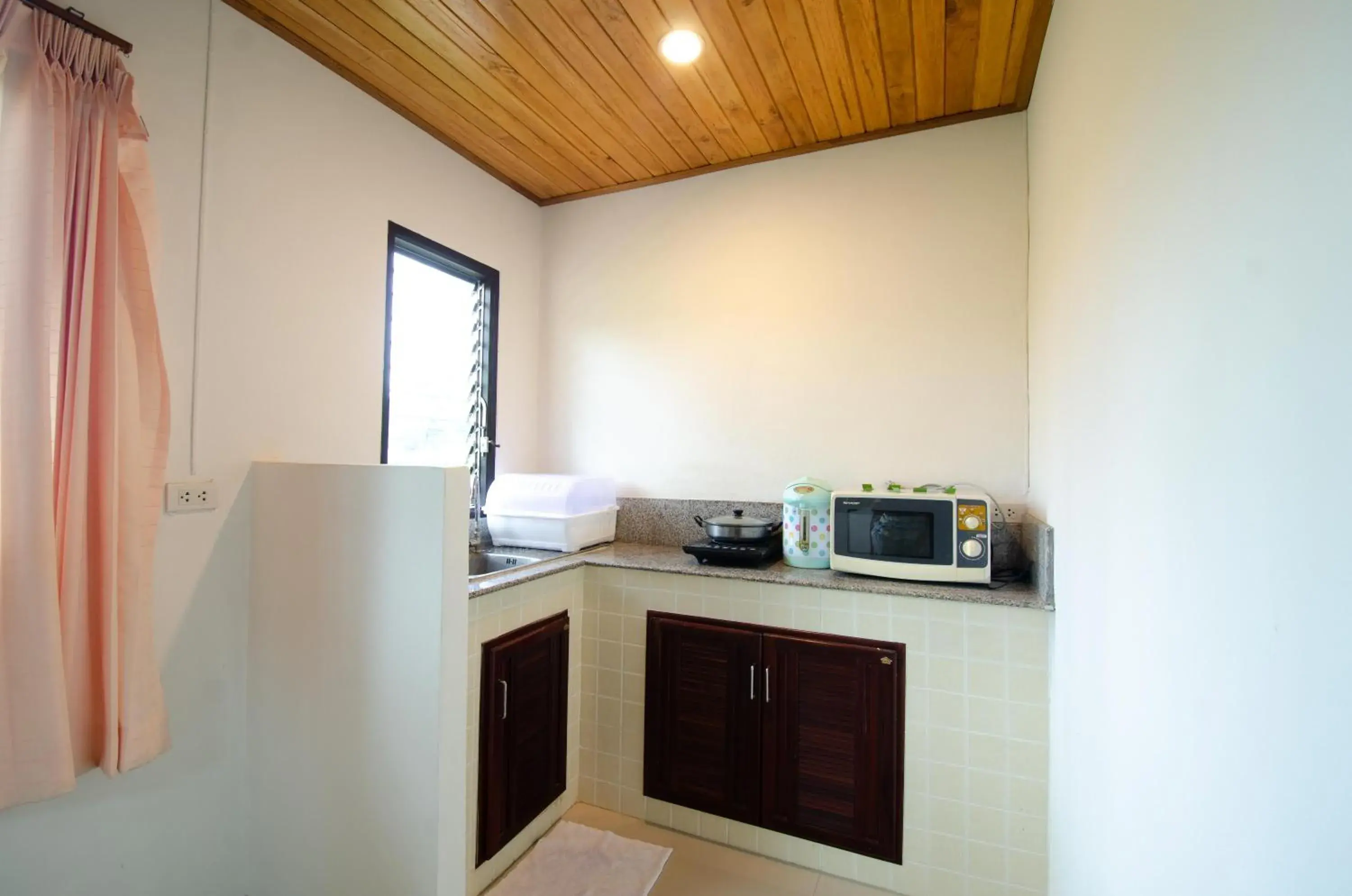 Kitchen/Kitchenette in Khum Laanta Resort - SHA Extra Plus