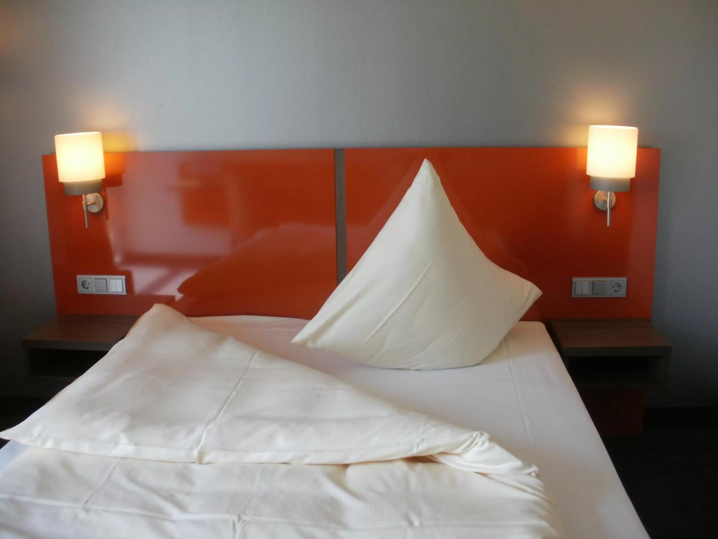 Bed in iQ-Hotel Ulm