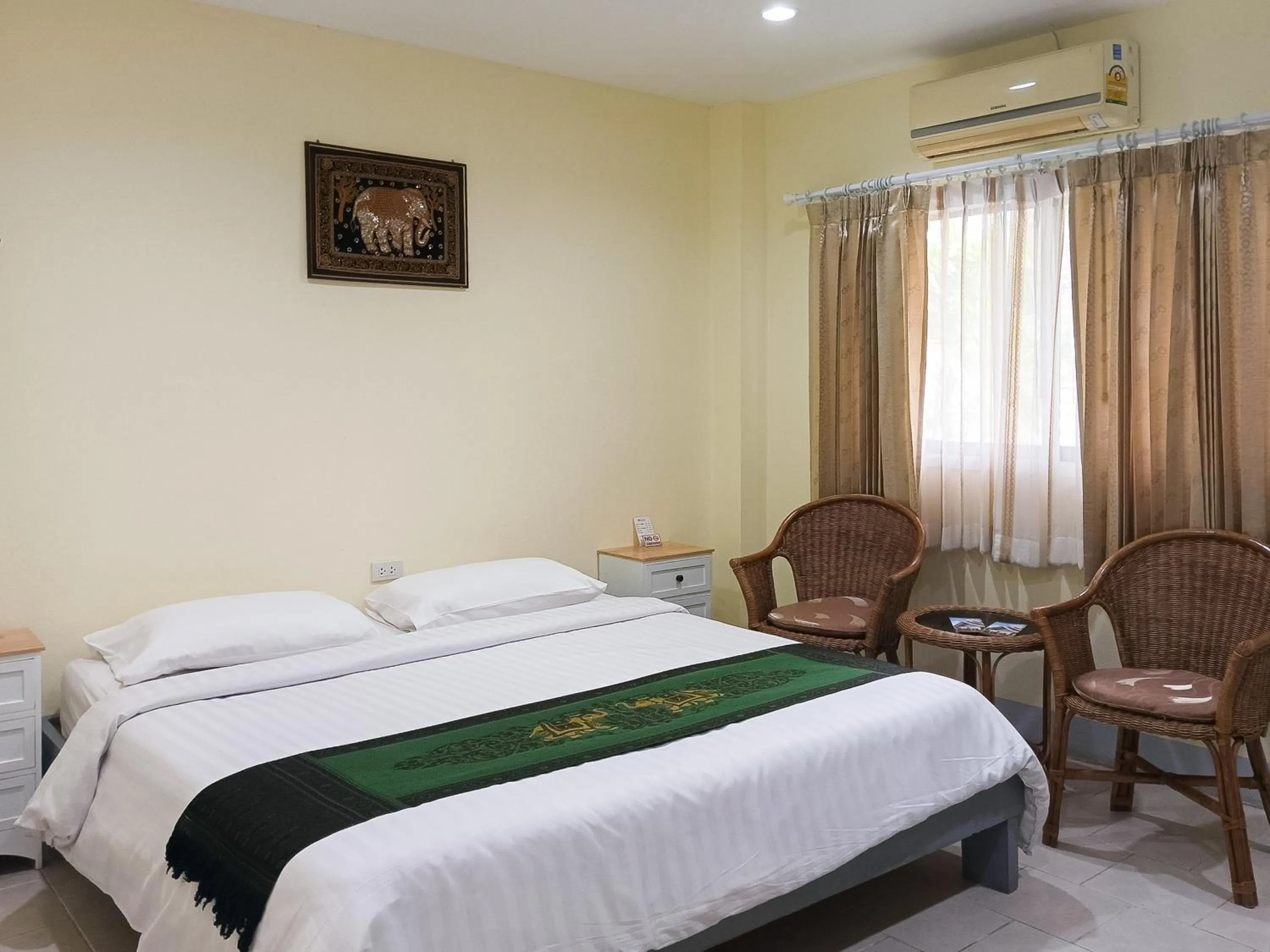 Bed in Silamanee Resort & Spa Hotel