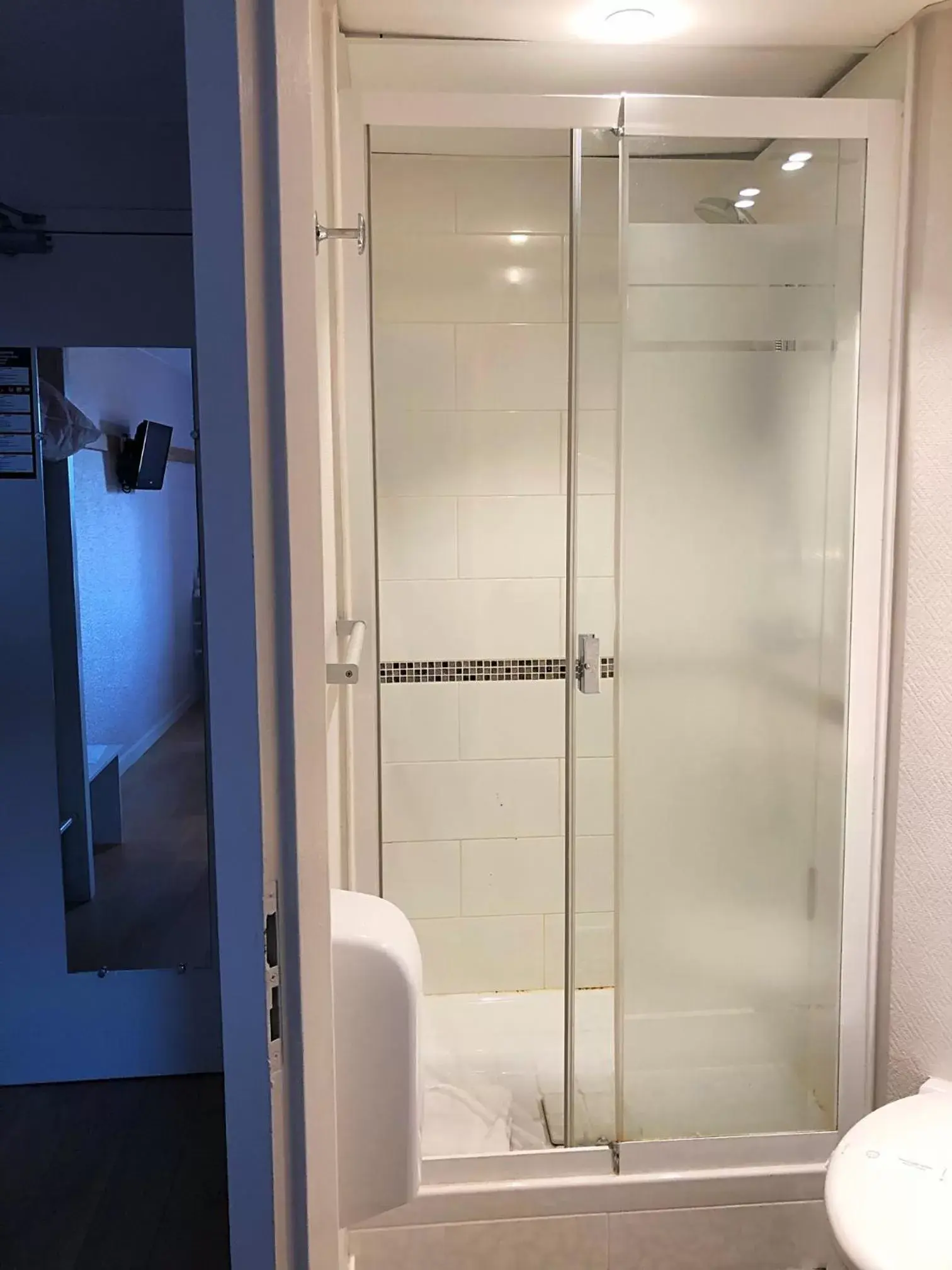 Shower, Bathroom in Logis Hôtel-Restaurant Les Loges