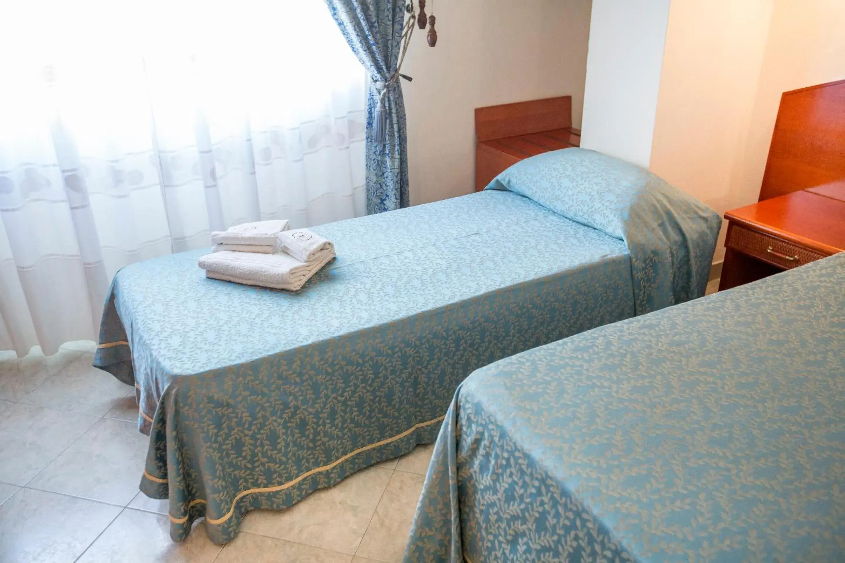 Bed in Hotel Mediterraneo