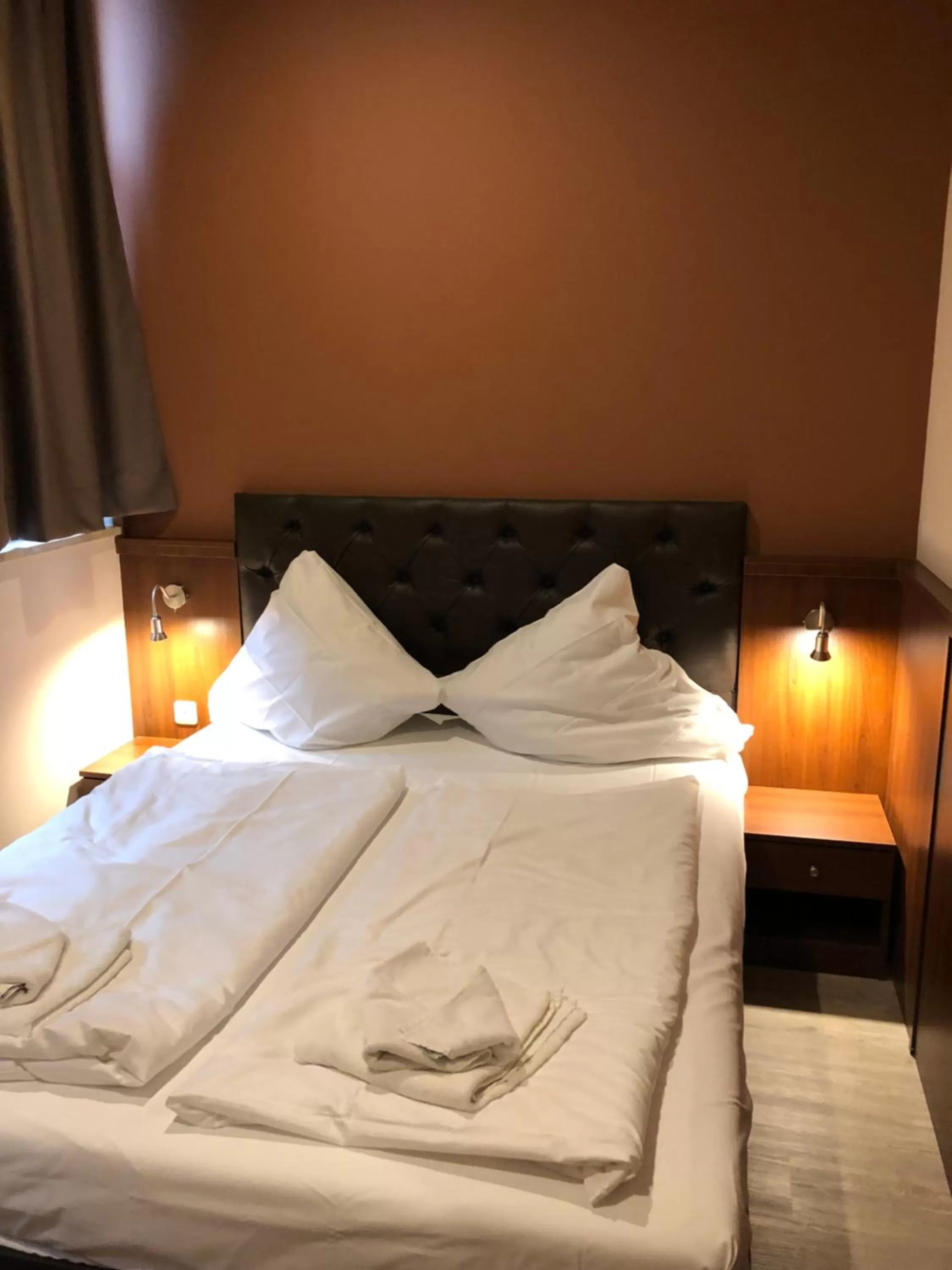 Bed in Hotel Poseidon