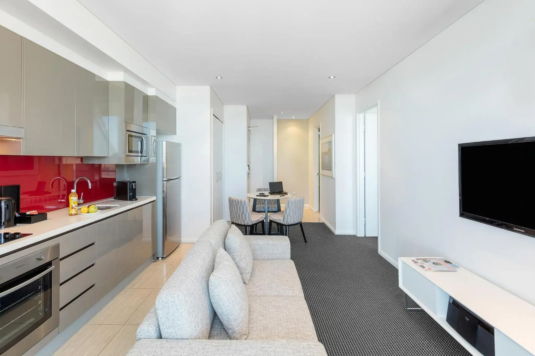TV and multimedia, Seating Area in Meriton Suites Campbell Street, Sydney