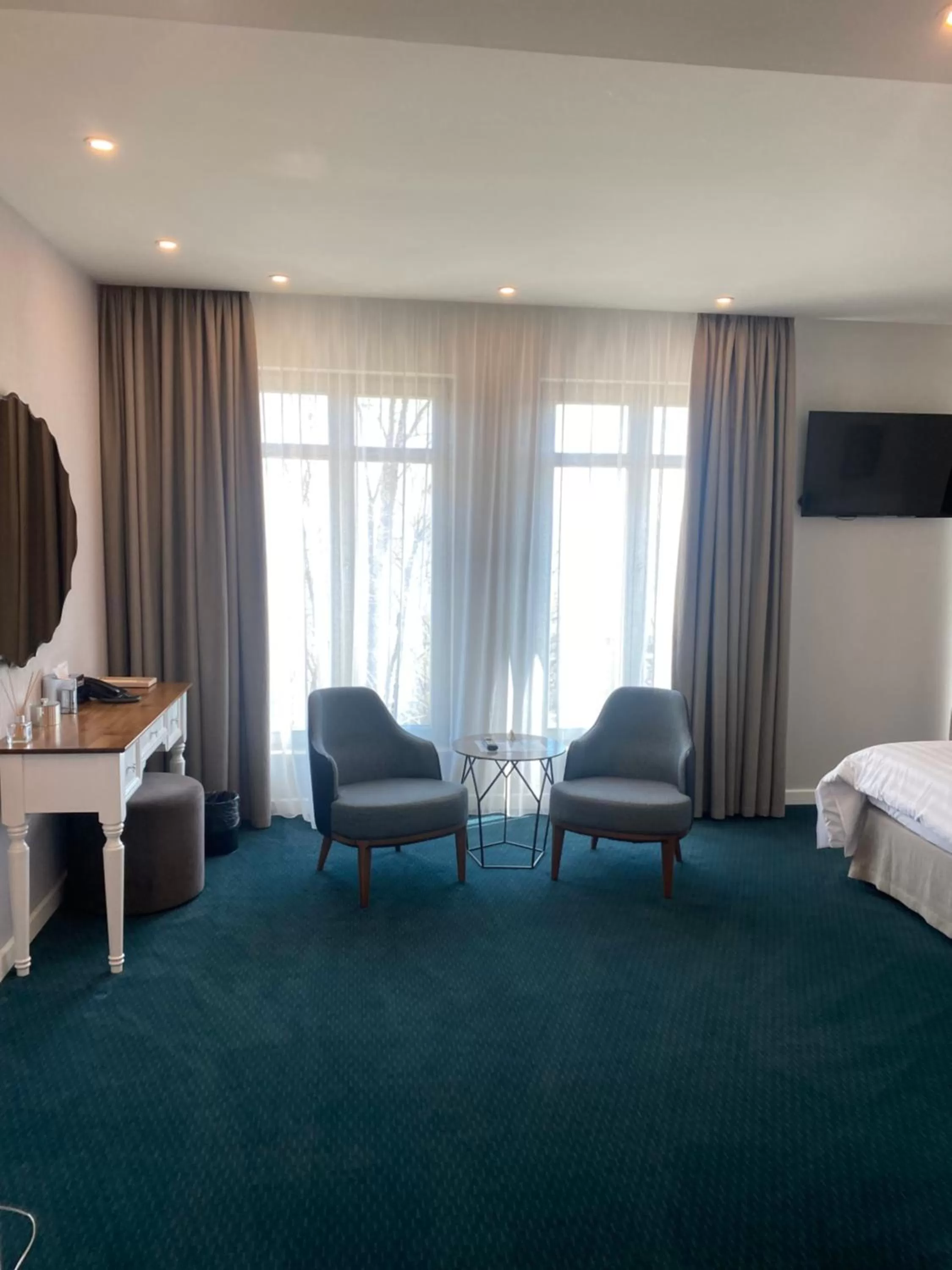 Seating area, Bed in Hotel Residence Promenade