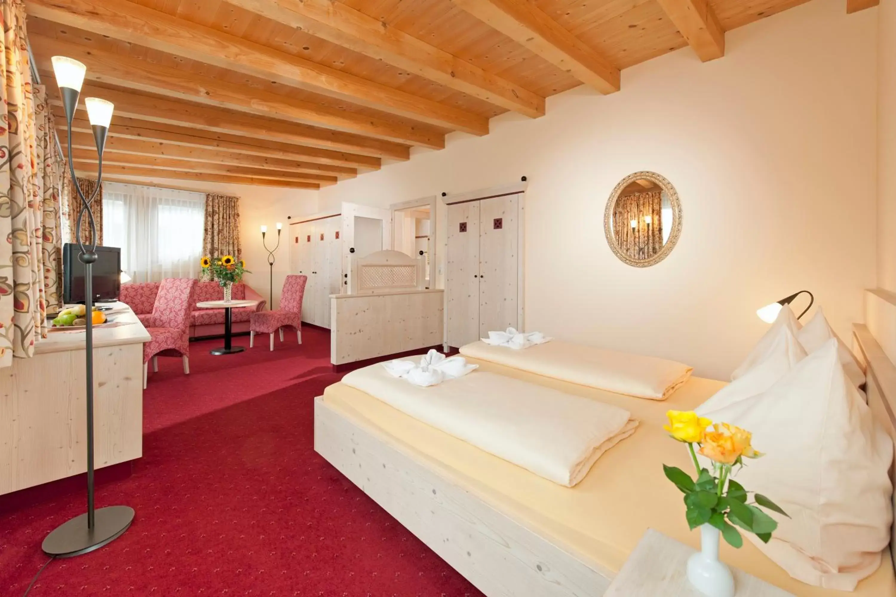 Photo of the whole room, Bed in Aktiv Hotel Schweizerhof Kitzbühel