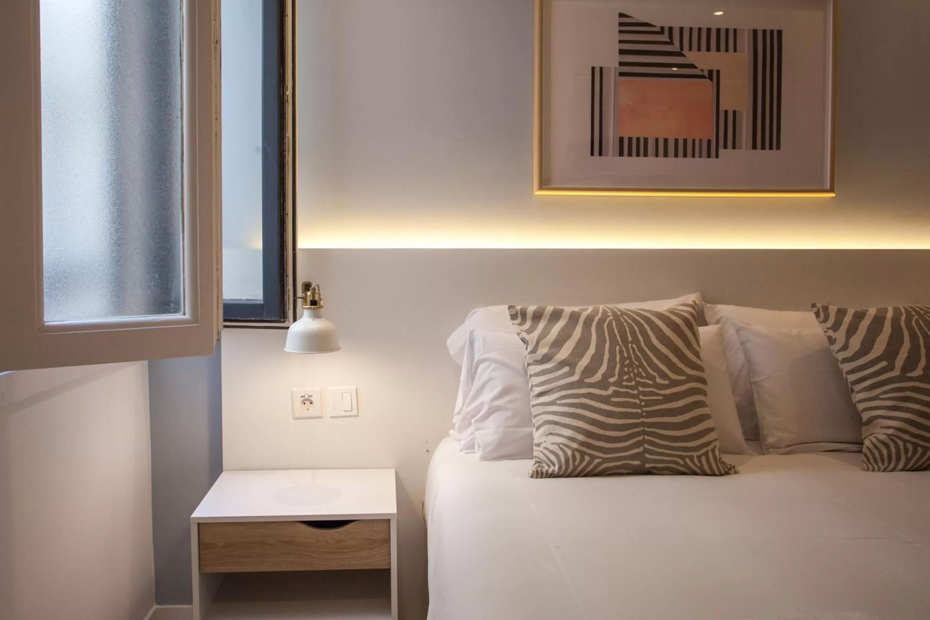 Decorative detail, Bed in Gran Central Suites