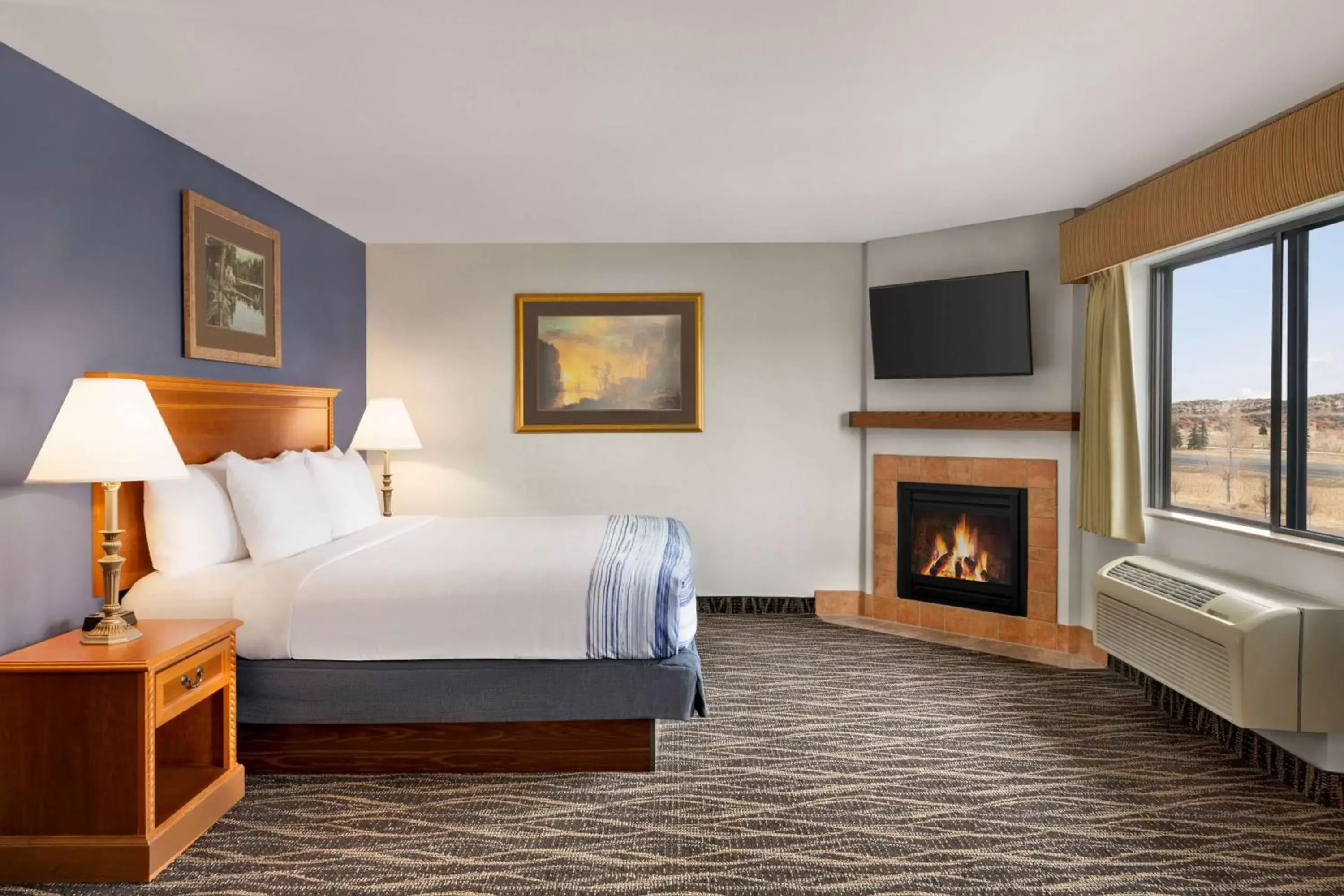 Photo of the whole room, Bed in AmericInn by Wyndham Laramie Near University of Wyoming