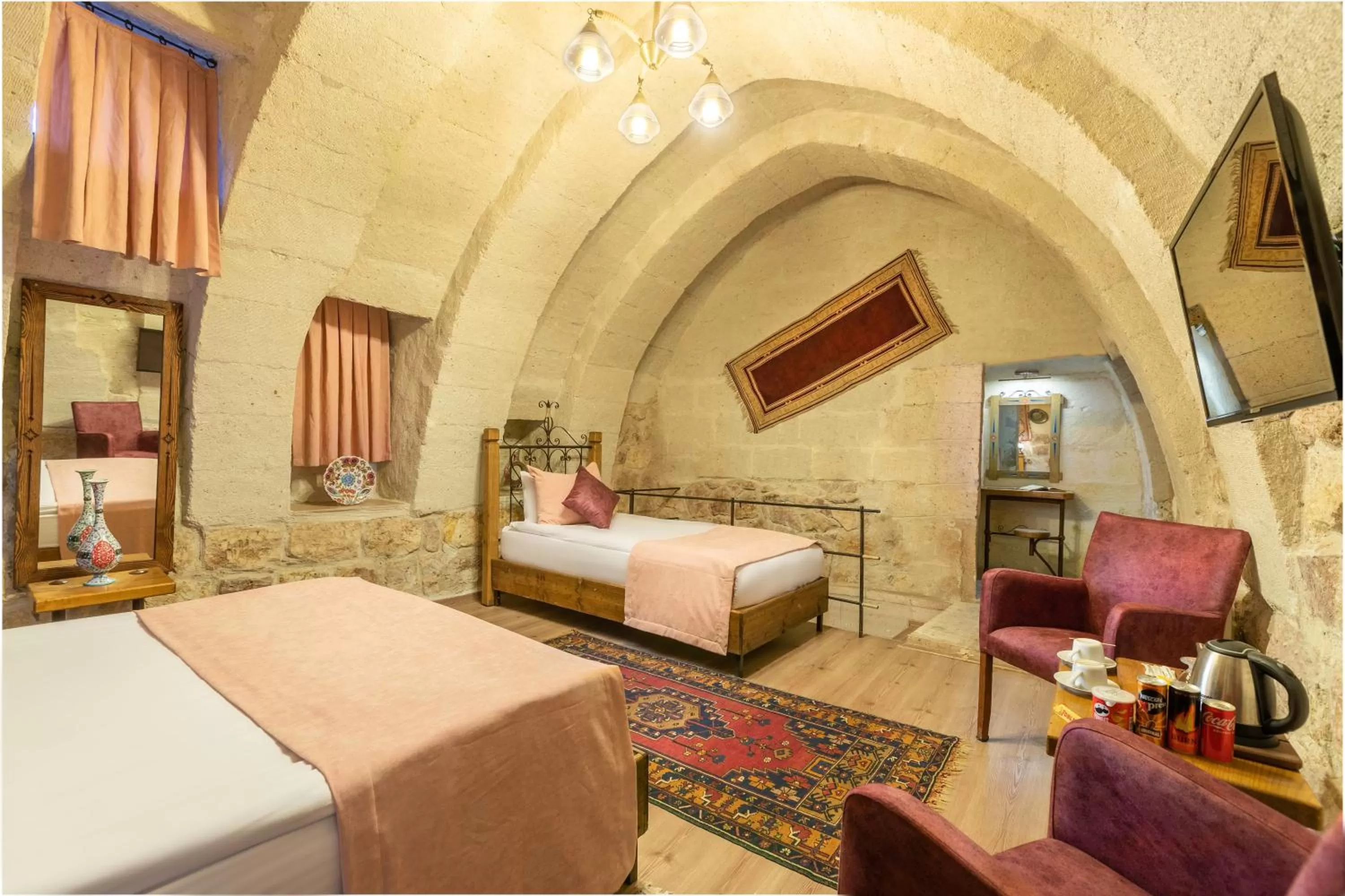 Seating area, Bed in Maron Stone House