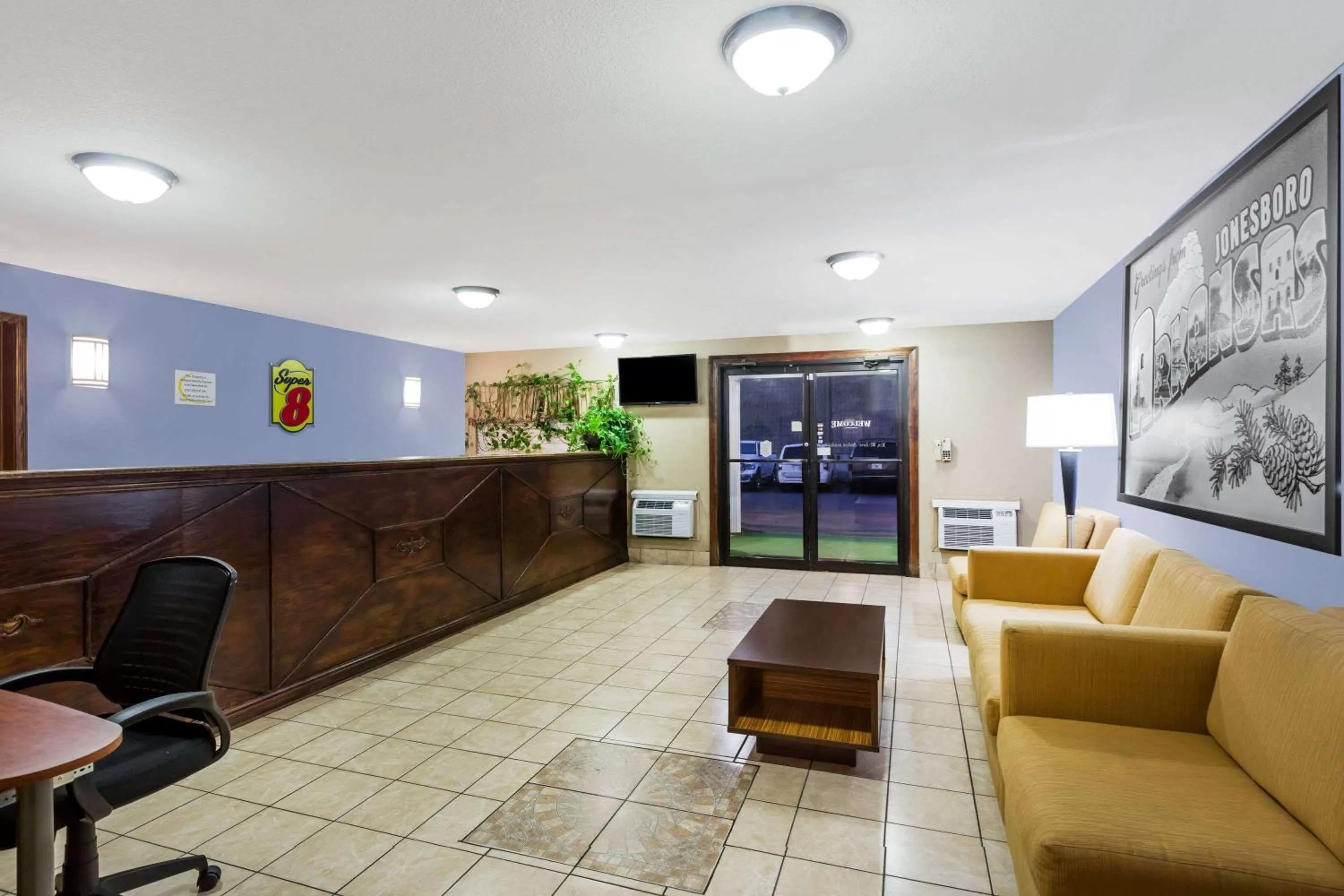 Lobby or reception in Super 8 by Wyndham Jonesboro
