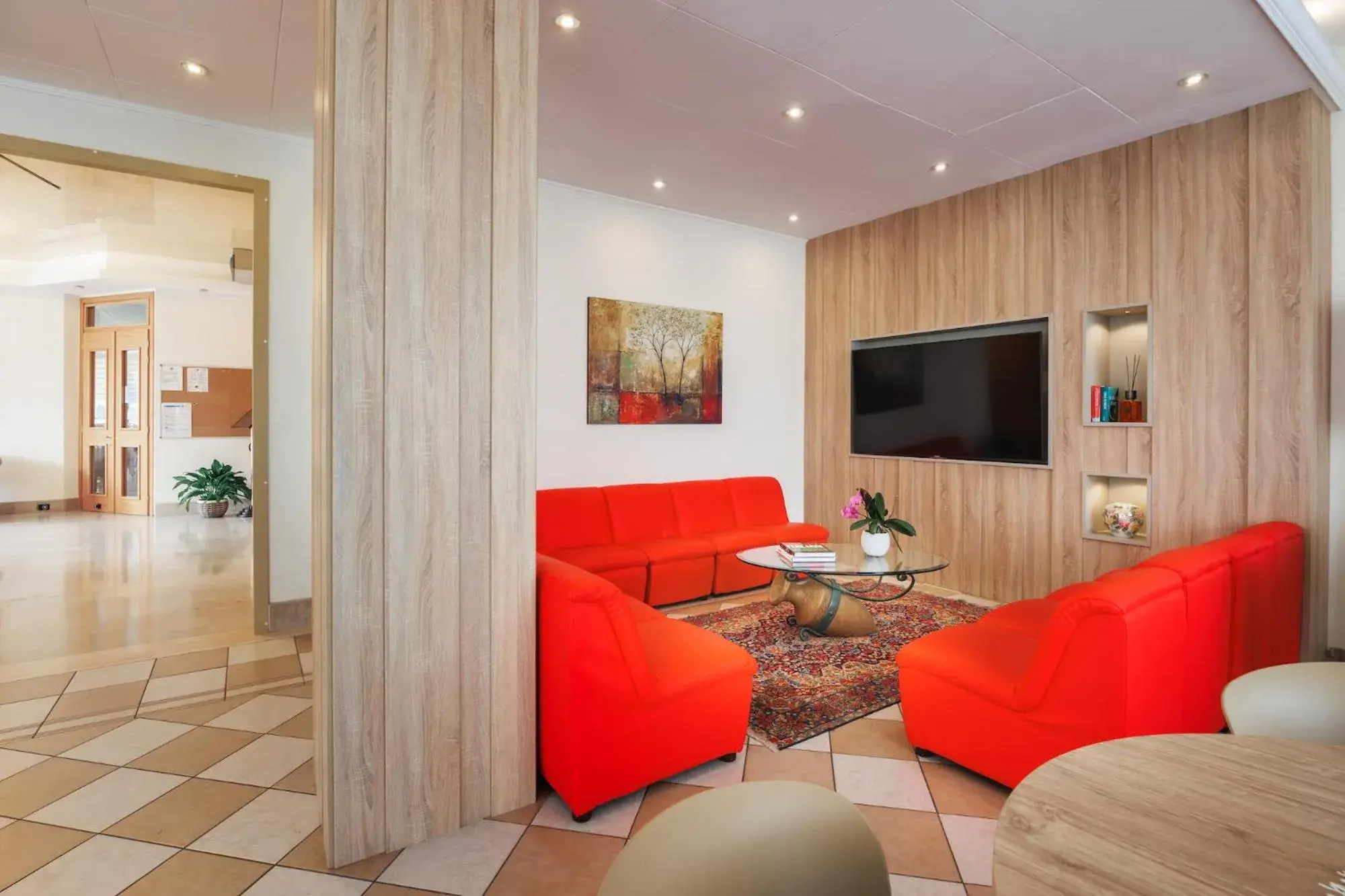 Communal lounge/ TV room, Seating Area in Hotel Jalisco