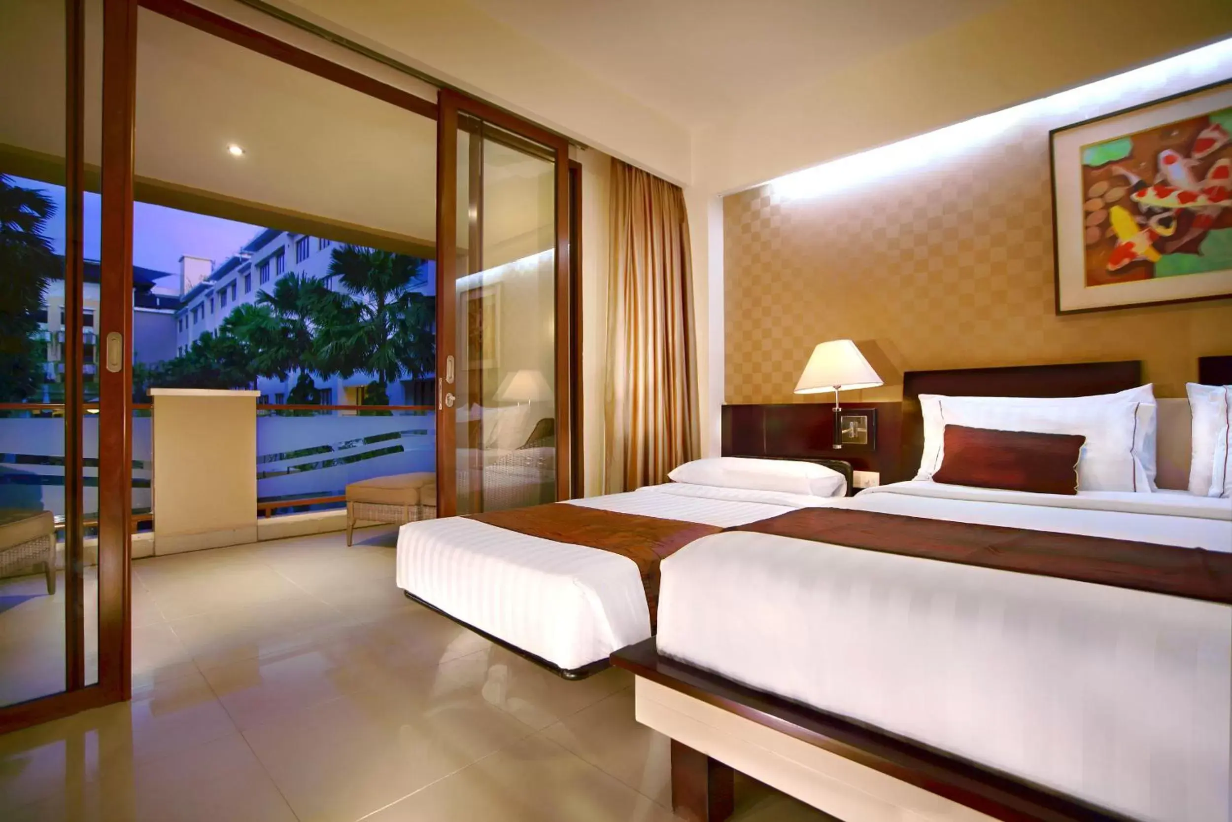 Photo of the whole room, Bed in ASTON Kuta Hotel and Residence