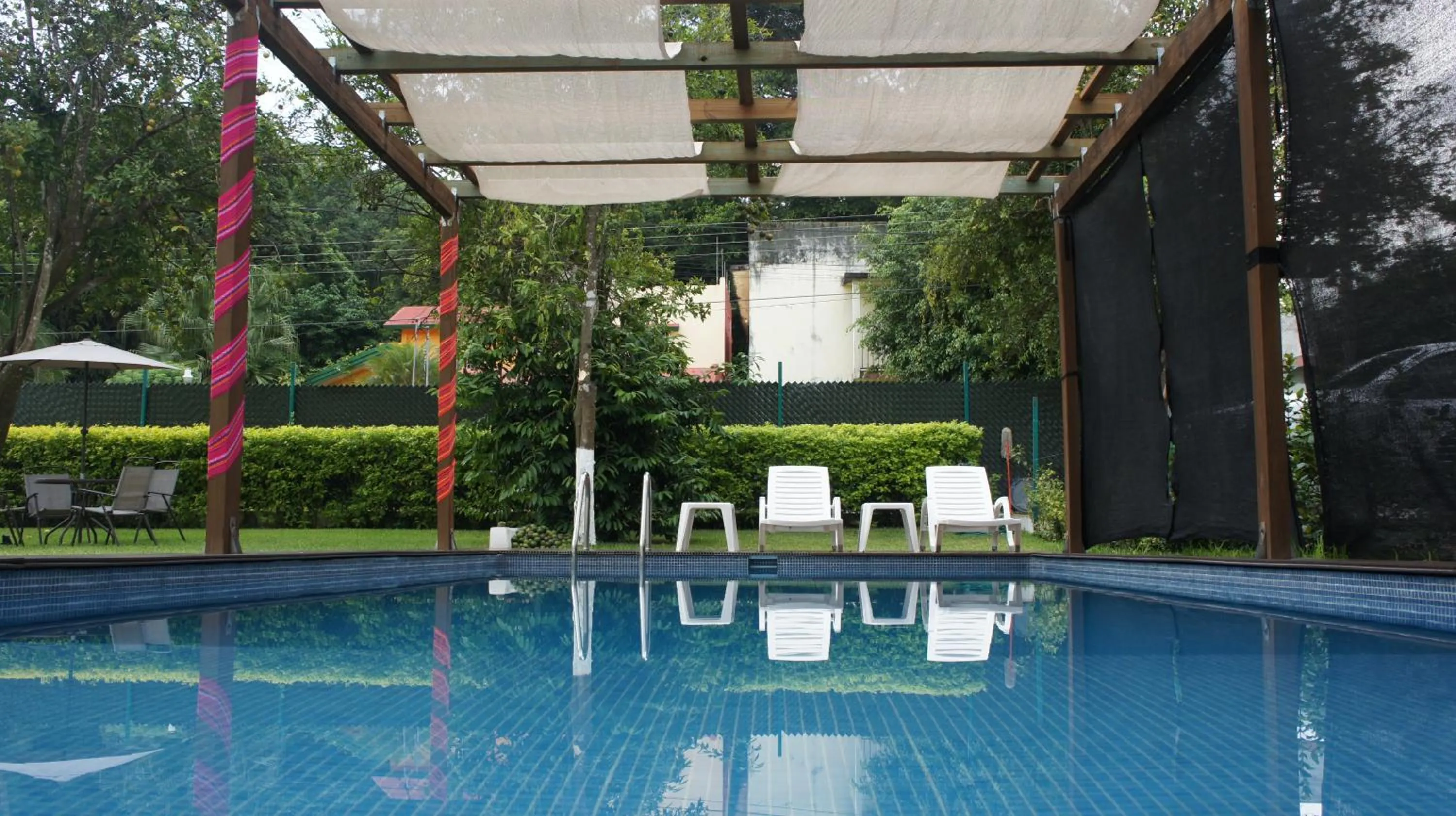 Swimming pool in Relax Inn Suites