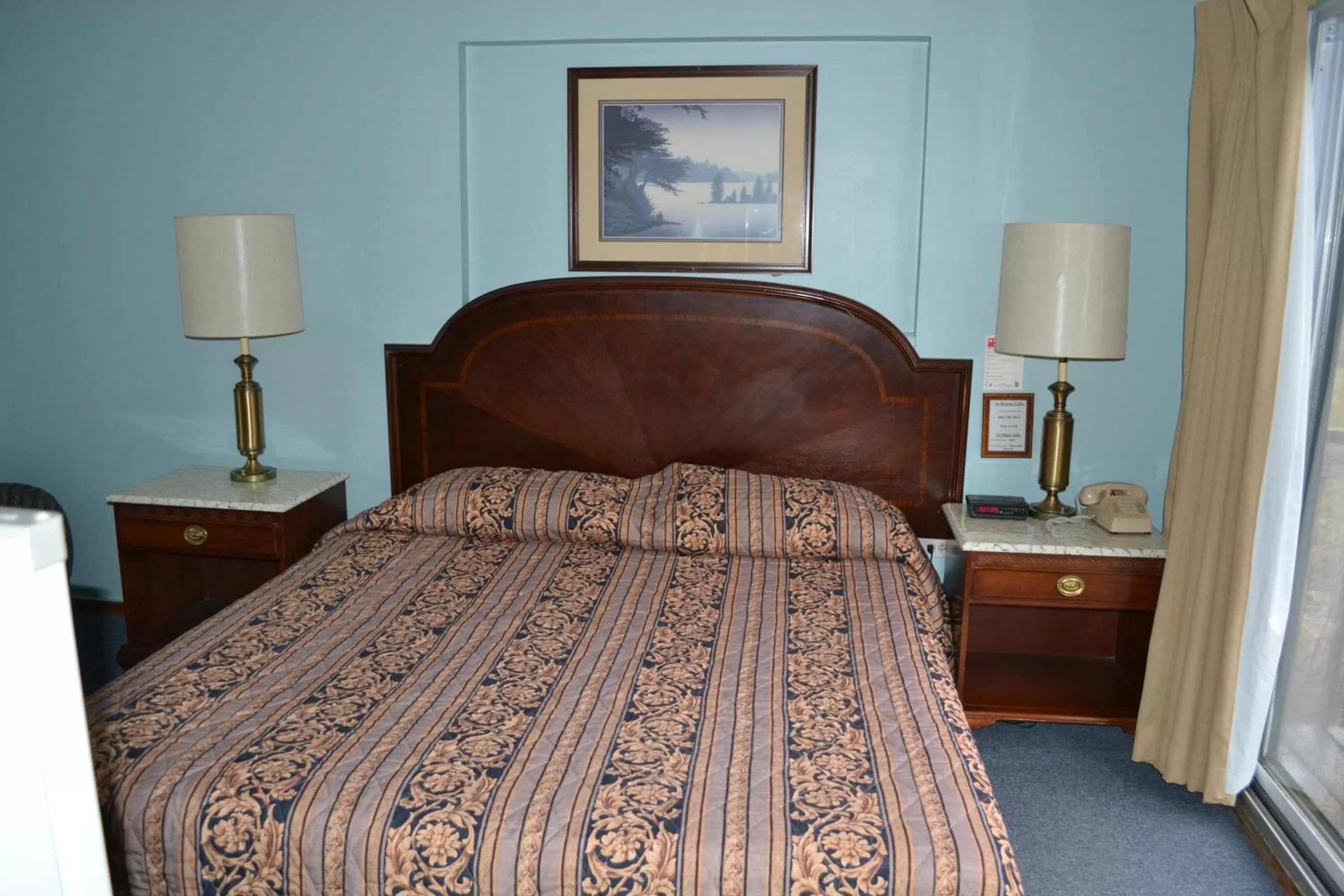 Bed in Parker's Motel