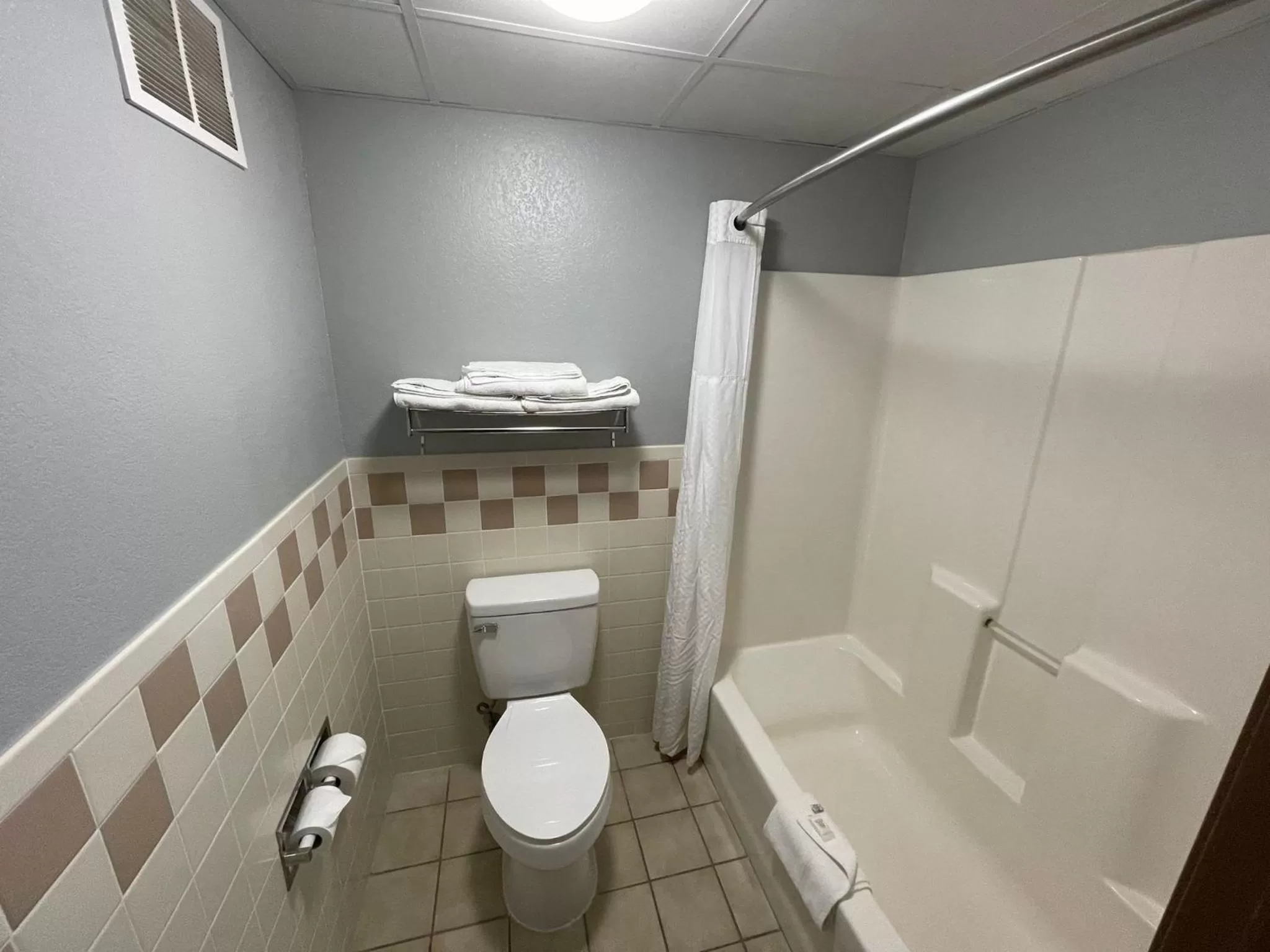 Bathroom in AmericInn by Wyndham Sayre