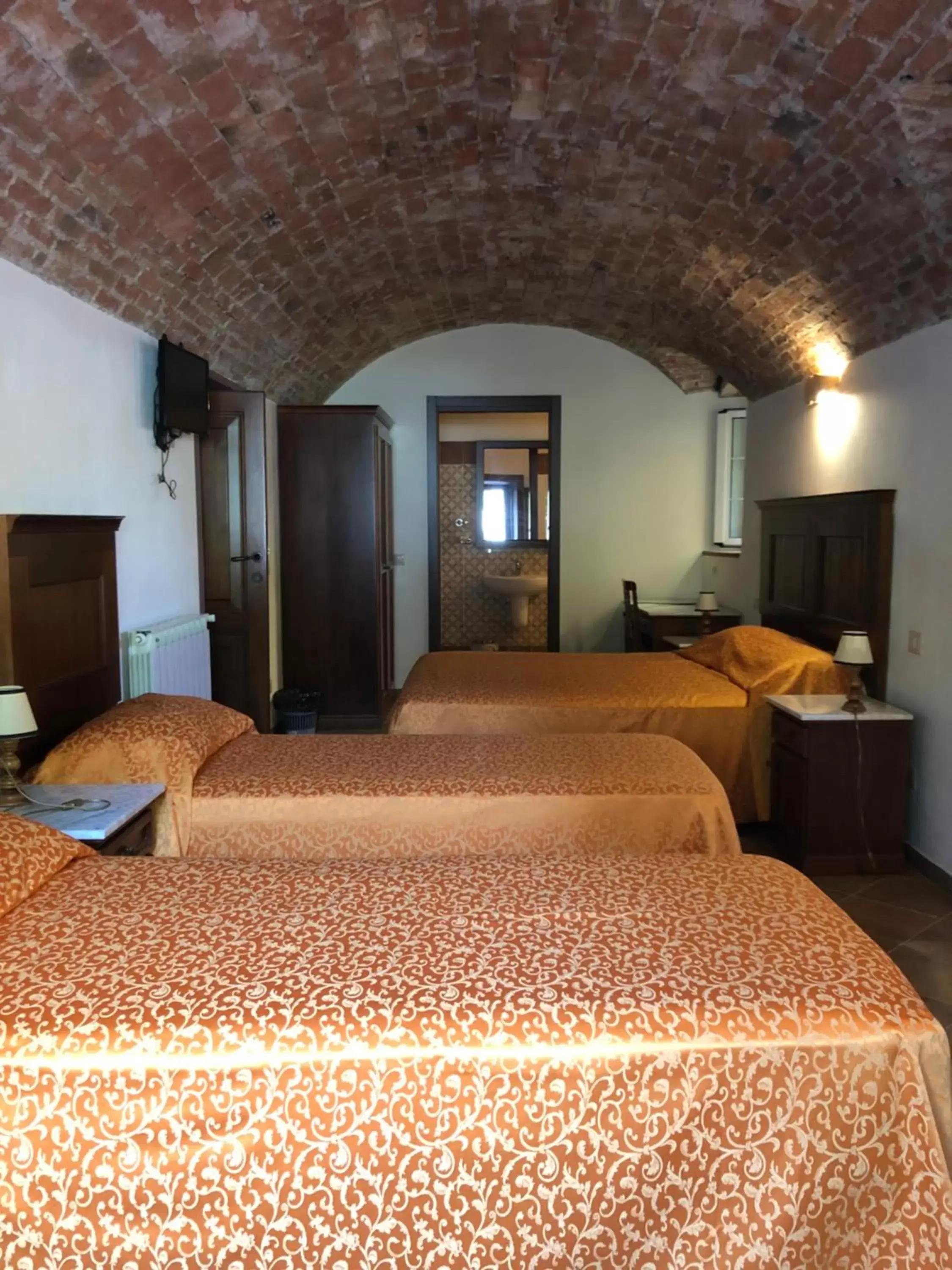 Bed in Albergo Miramonti