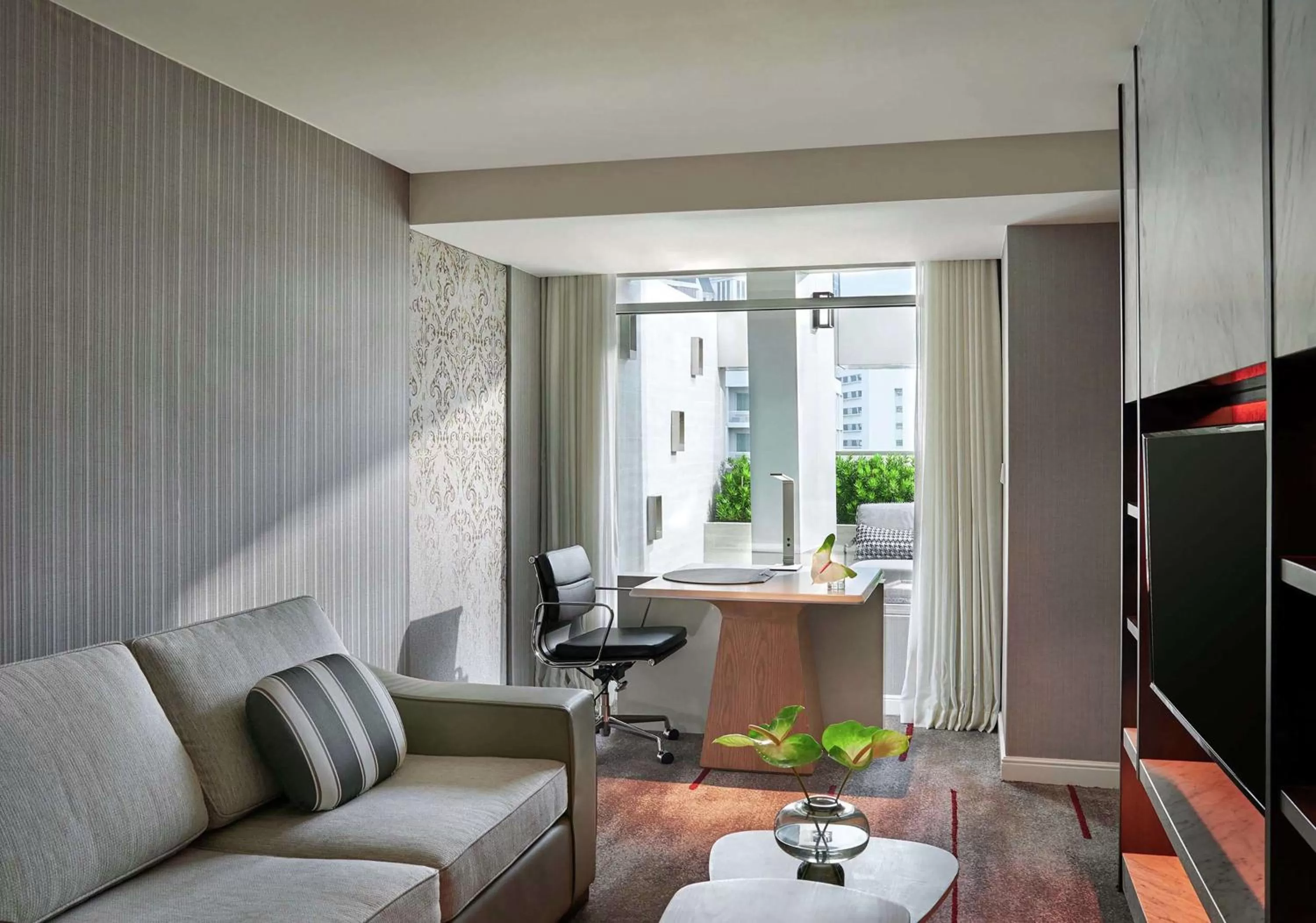 Living room in DoubleTree by Hilton Bangkok Ploenchit