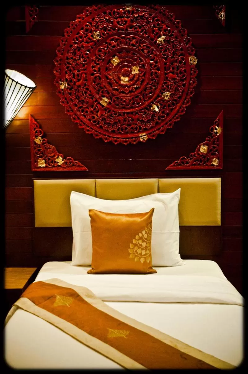 Bed in Ruenkanok Thaihouse Resort