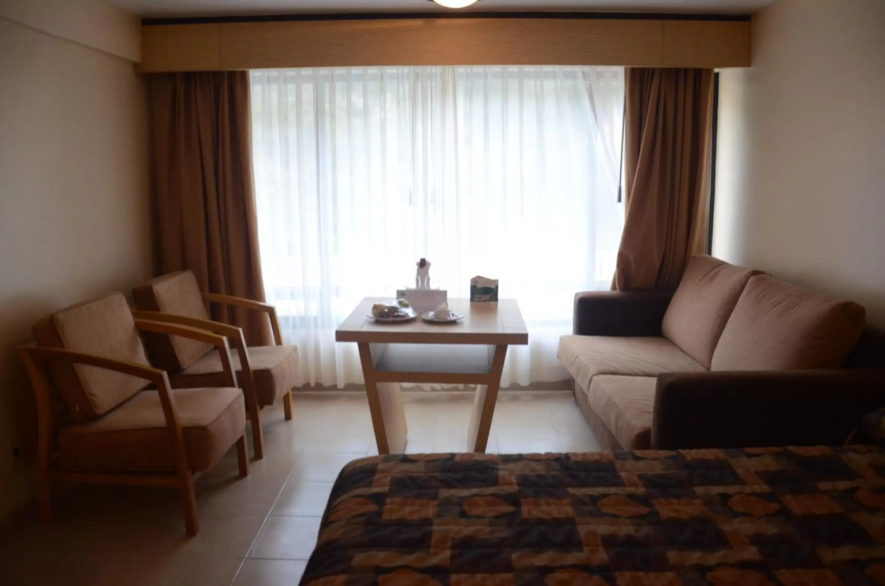 Bed, Seating Area in Hotel y Aguas Termales de Chignahuapan