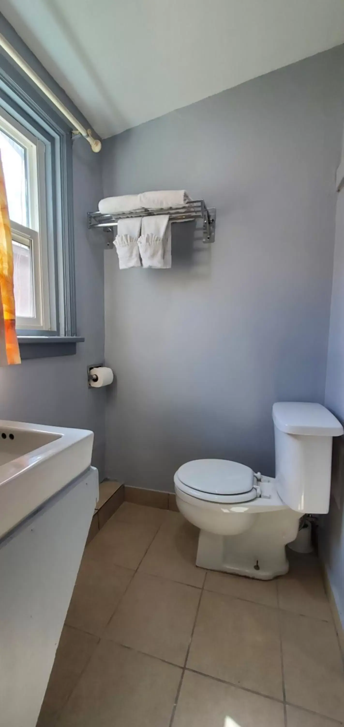 Toilet, Bathroom in Travelers Inn