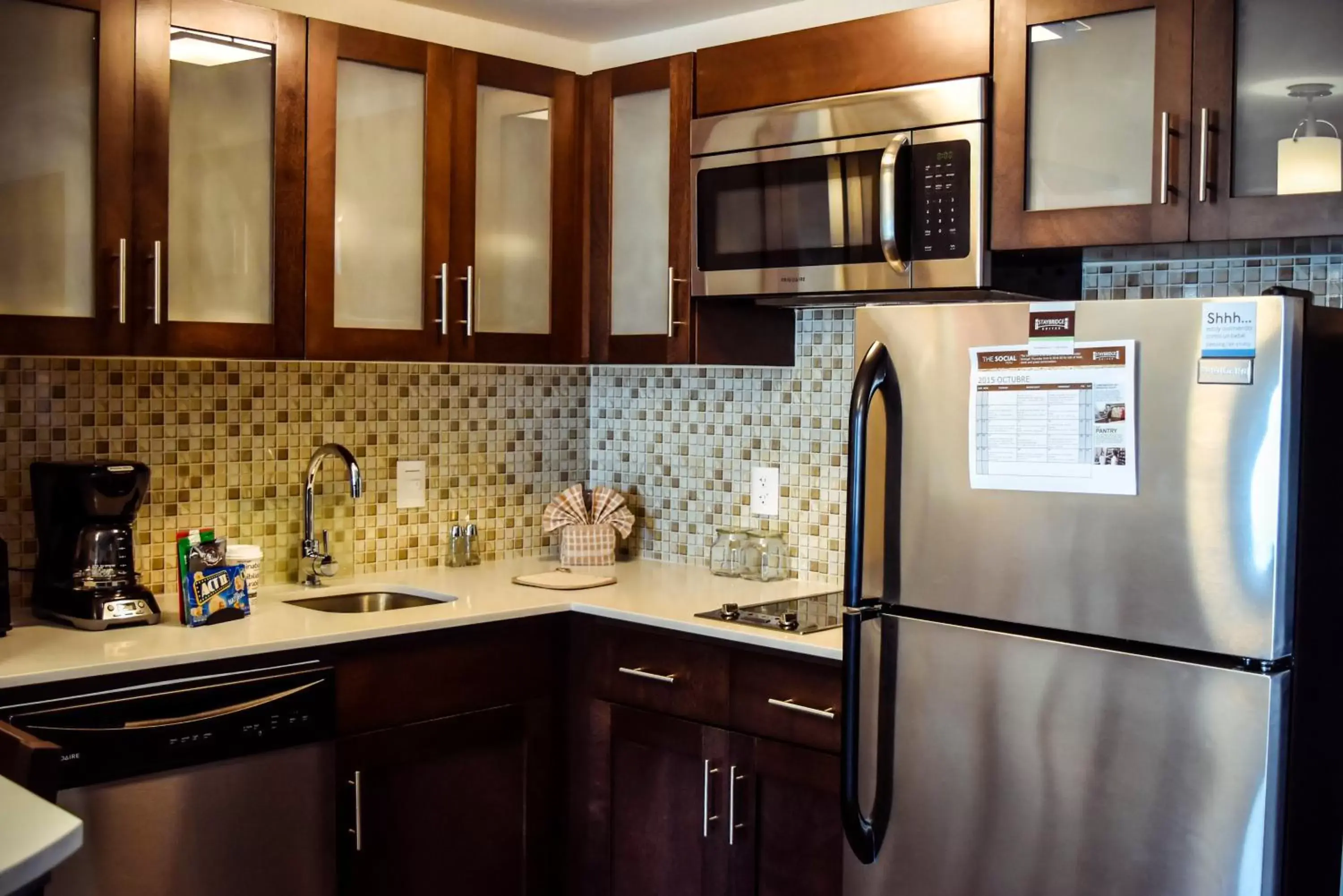 Photo of the whole room, Kitchen/Kitchenette in Staybridge Suites Puebla, an IHG Hotel