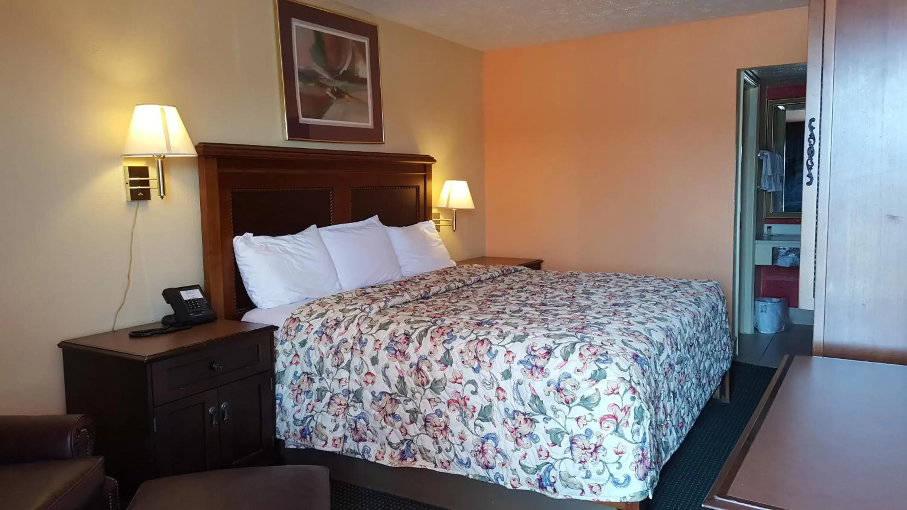 Bed in Garden Inn and Extended Stay