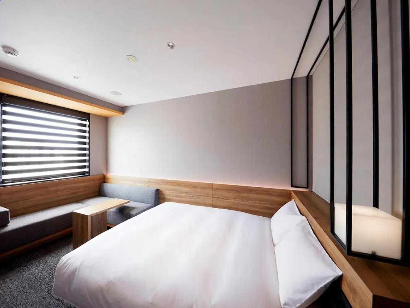 Bed in hotel androoms Shin-Osaka Bed in hotel androoms Shin-Osaka