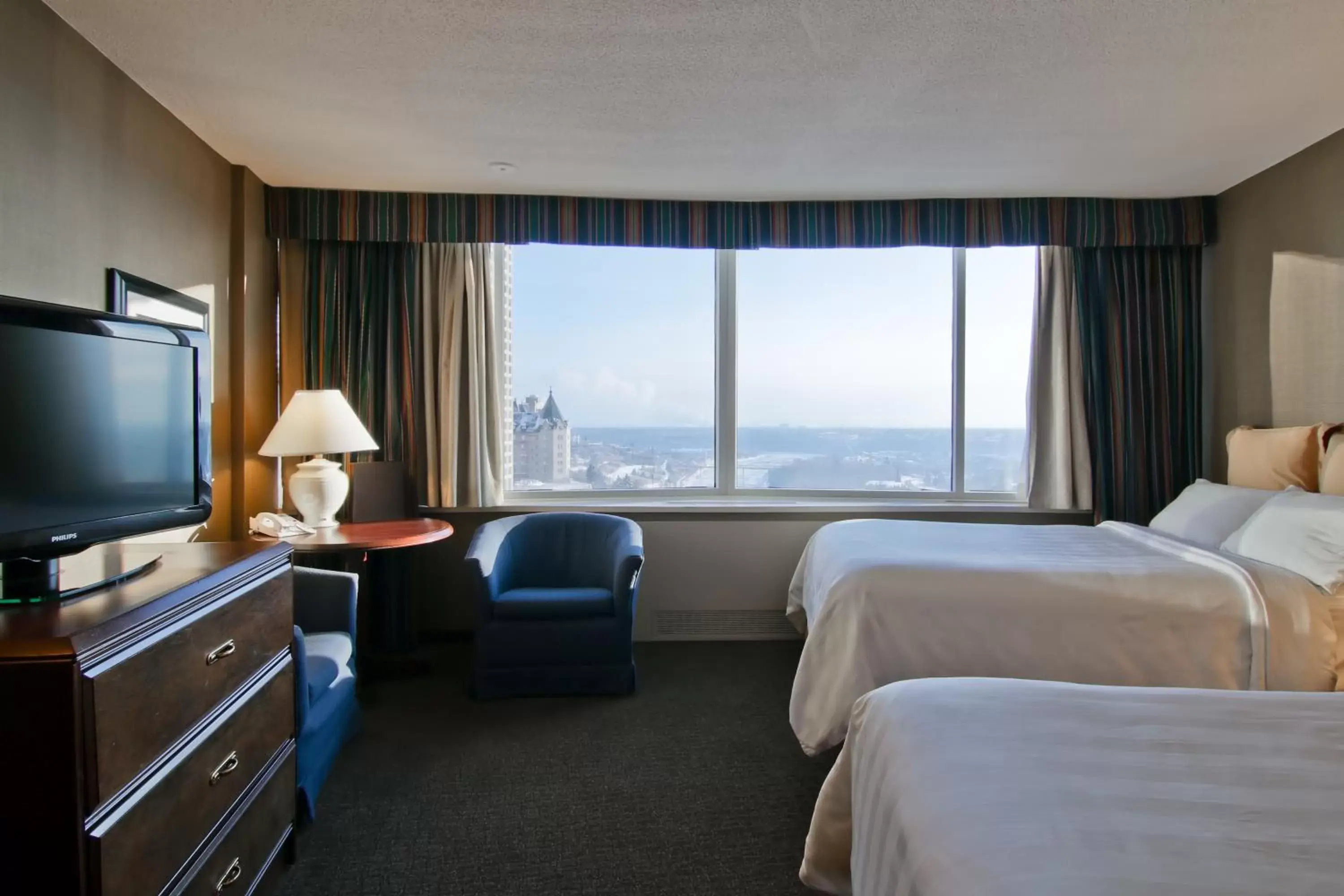 Double Room with Two Double Beds with River View in Chateau Lacombe Hotel Double Room with Two Double Beds with River View in Chateau Lacombe Hotel