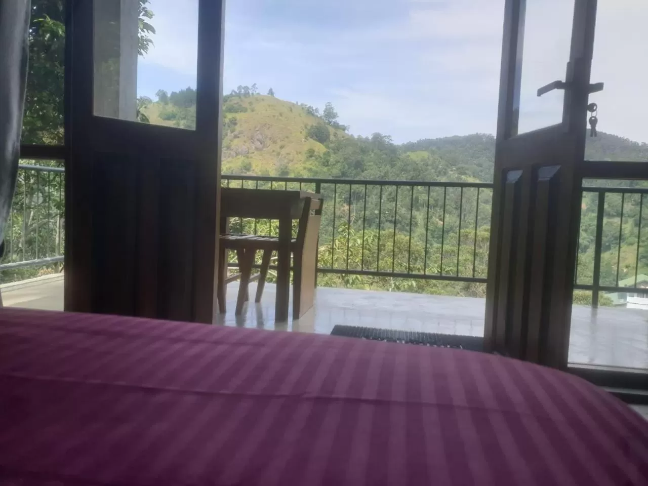 Balcony/Terrace, Bed in Raveena Guest House