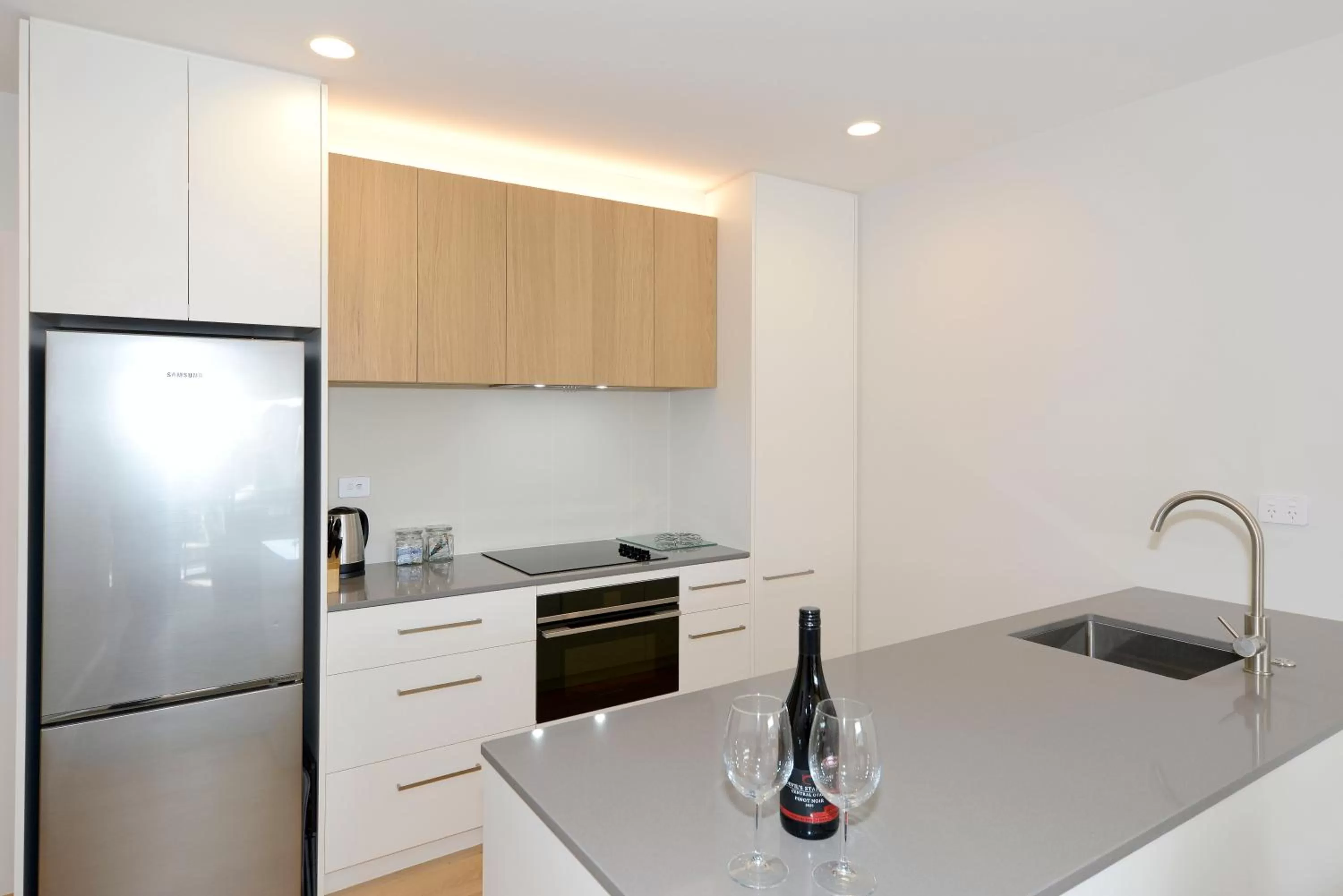 Kitchen or kitchenette in West Fitzroy Apartments
