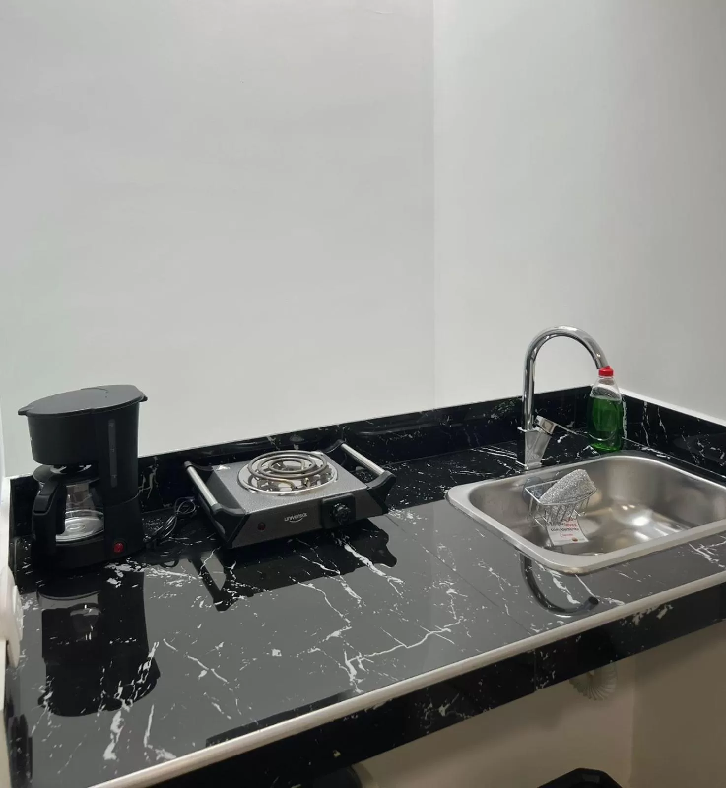 Kitchen or kitchenette in Hotel Boutique Business Center