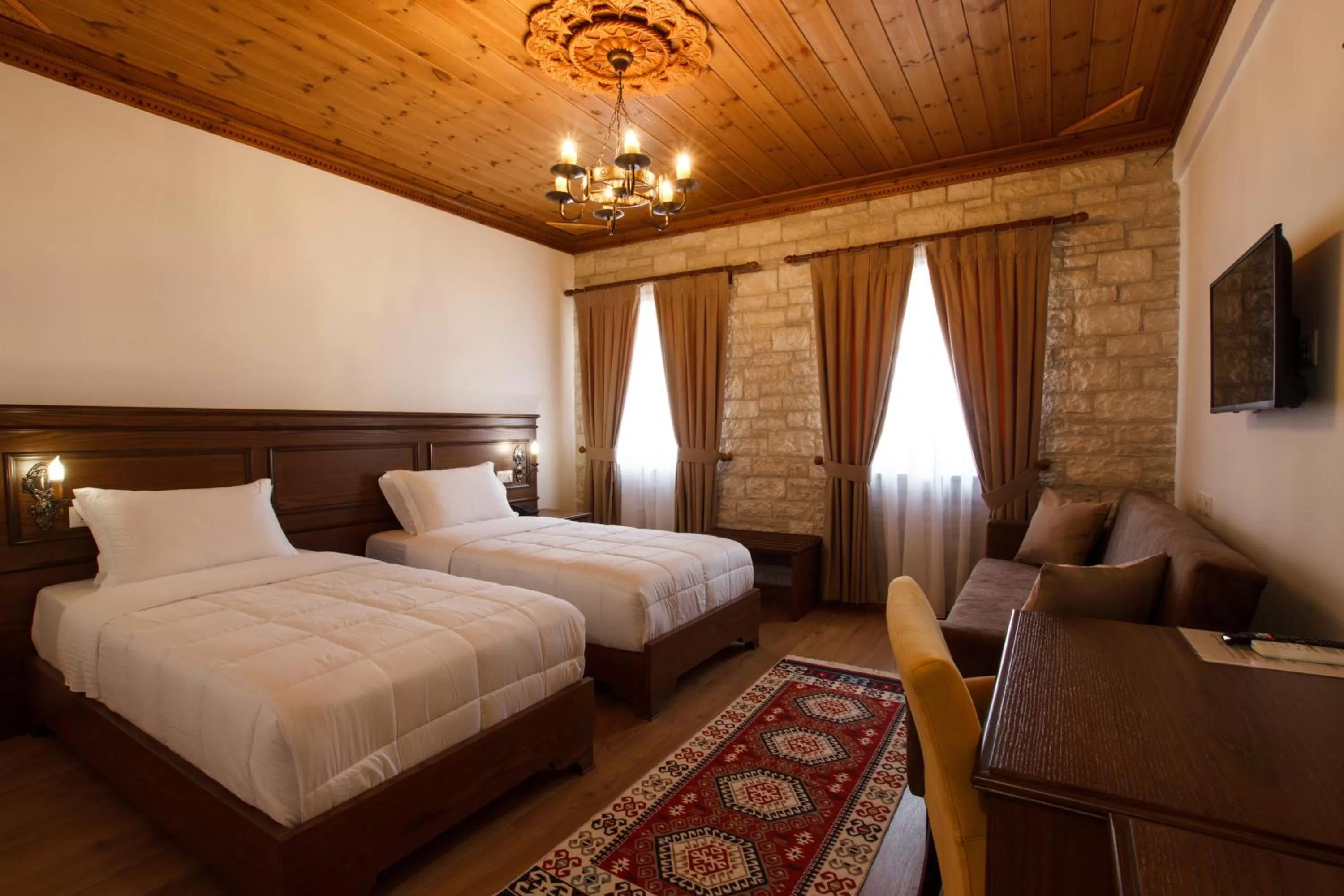 Bed in Rose Garden Hotel