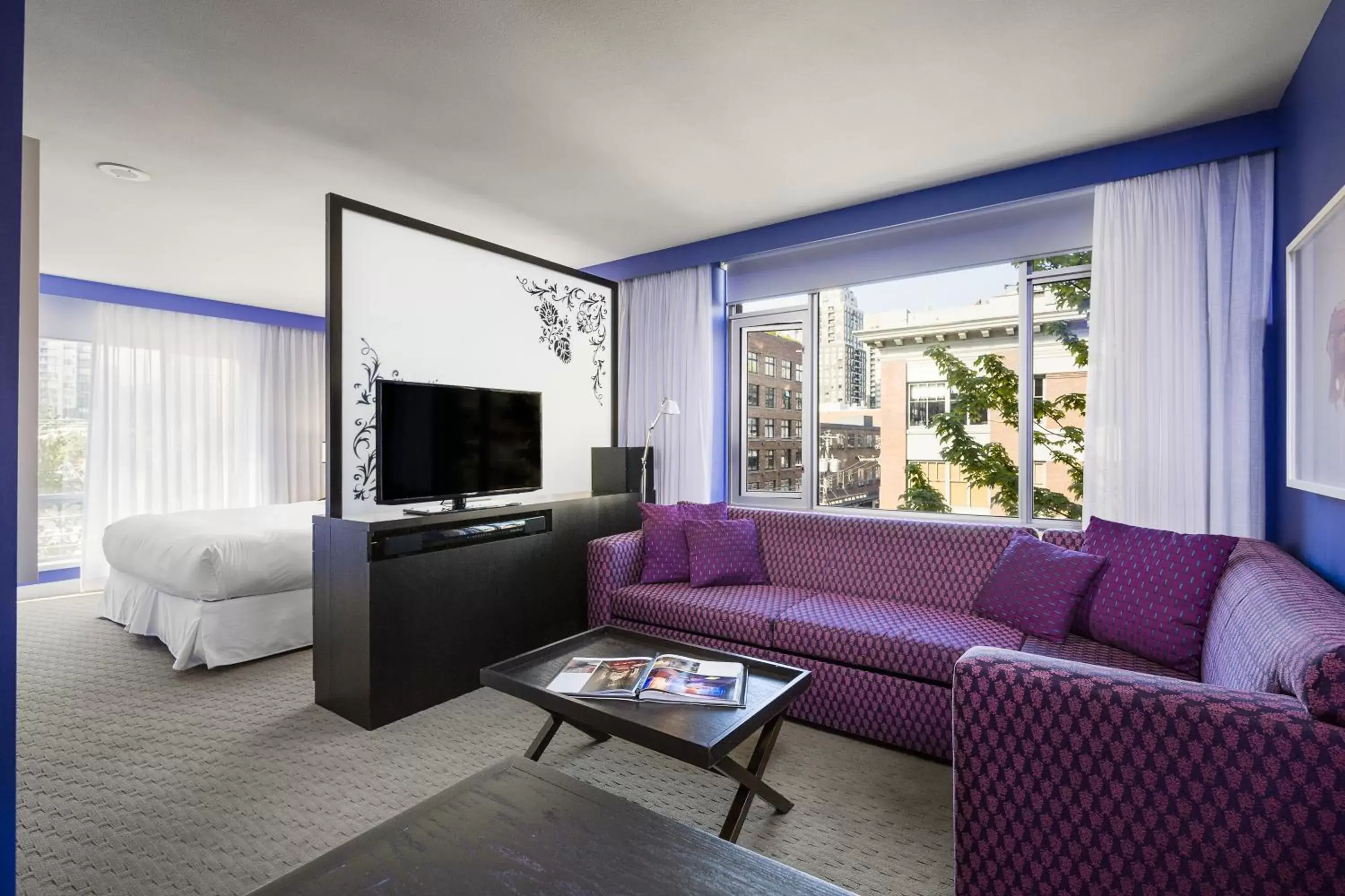 Bed, Seating Area in OPUS Vancouver