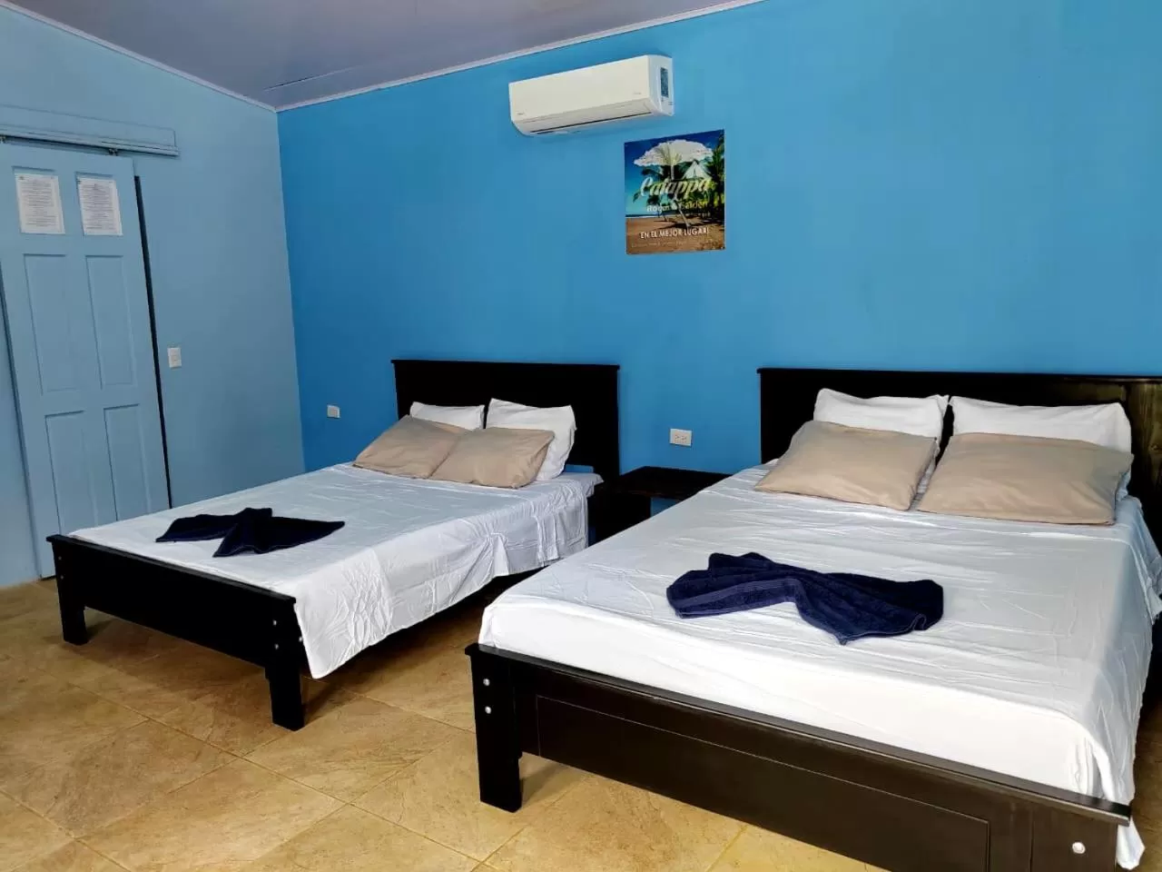 Property building, Bed in Hotel Catappa