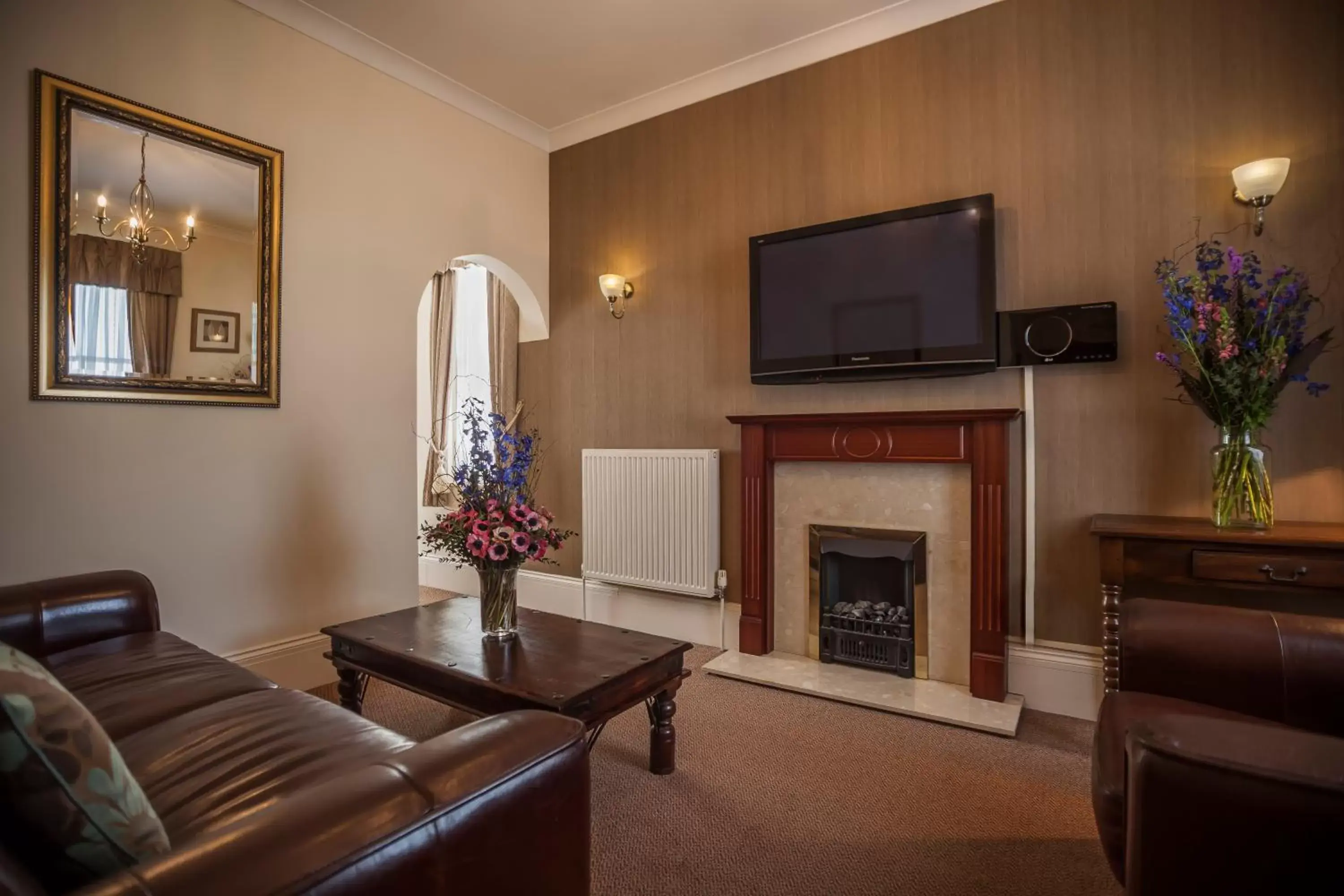 Seating area, TV/Entertainment Center in Devonshire Park Hotel