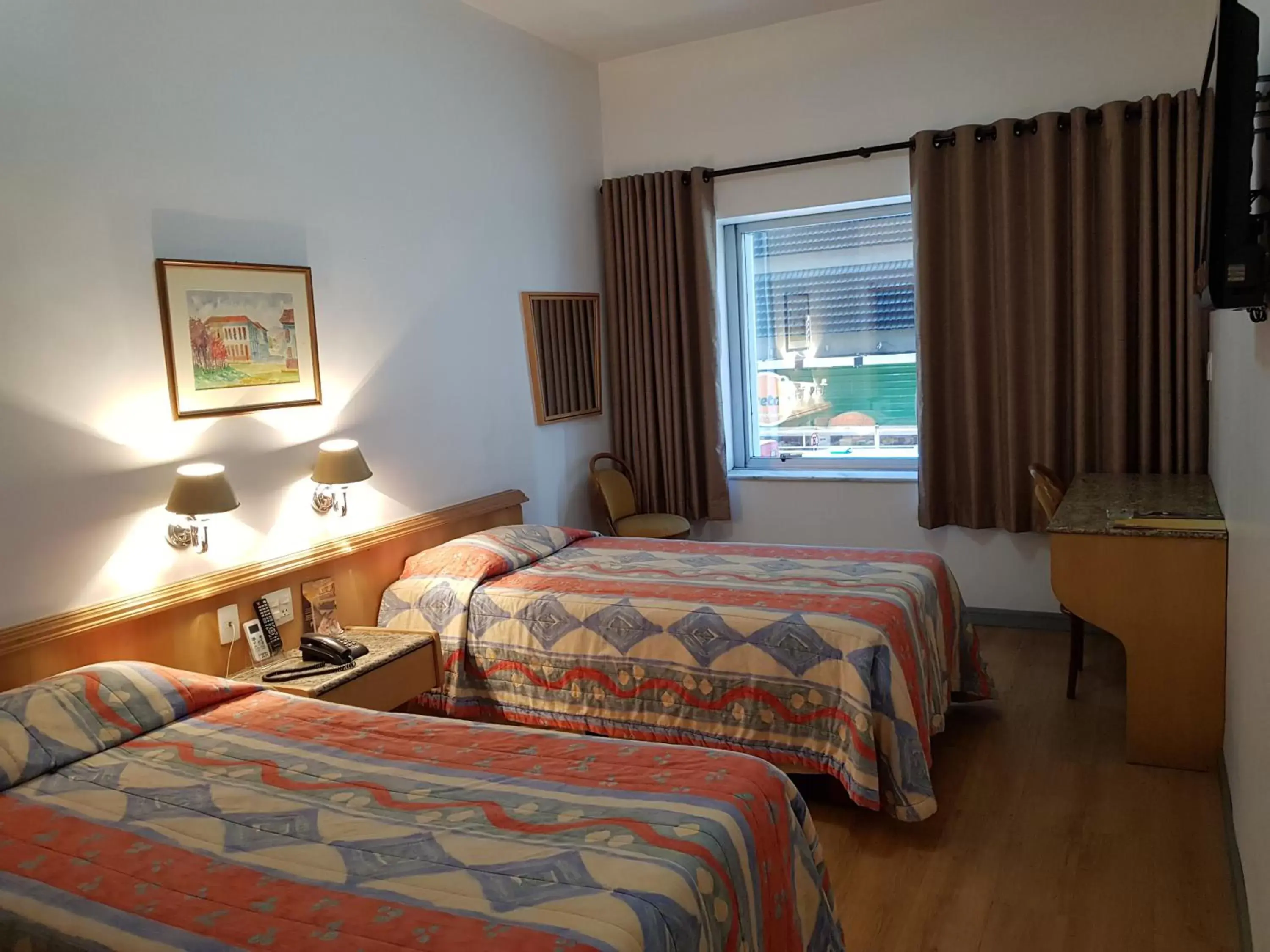 Bed in Ritz Plaza Hotel Bed in Ritz Plaza Hotel