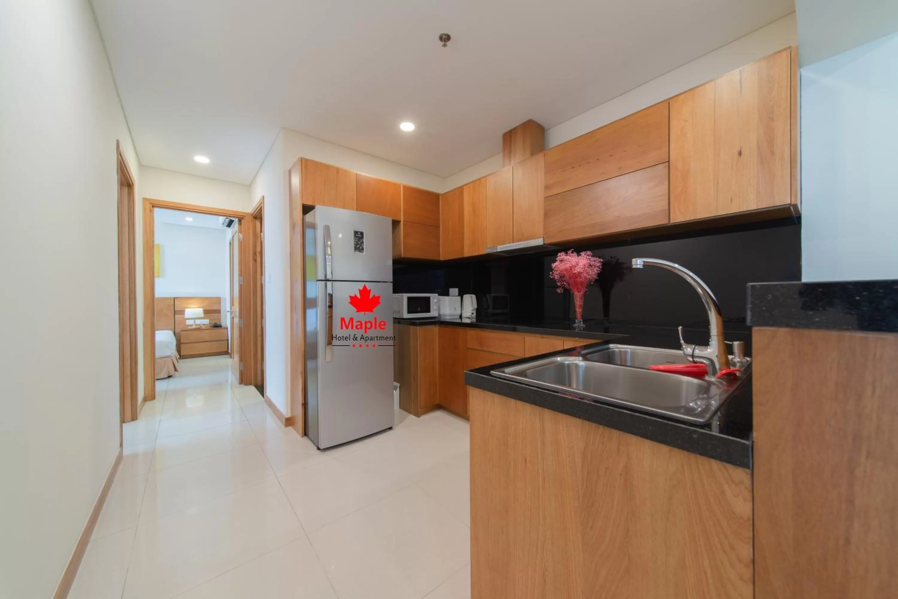 kitchen in Maple Hotel & Apartment
