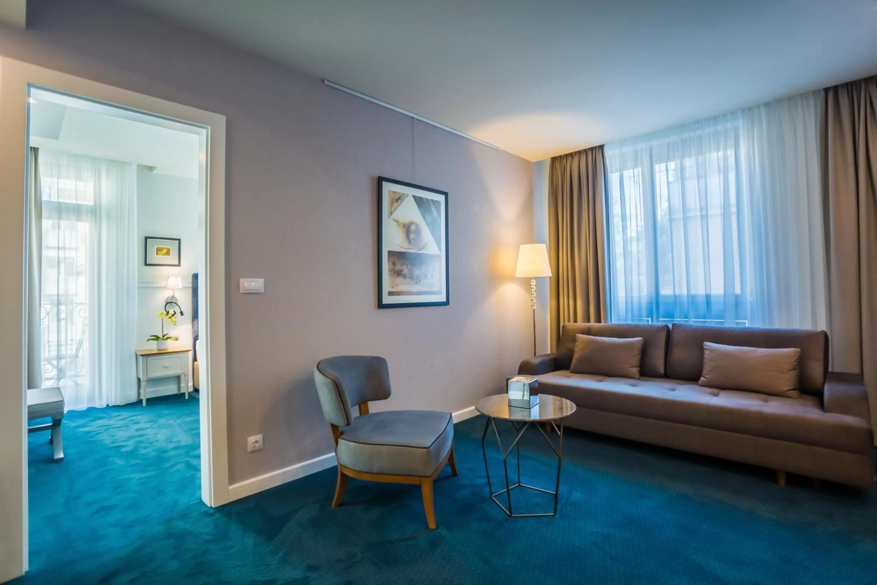 Communal lounge/ TV room in Hotel Residence Promenade