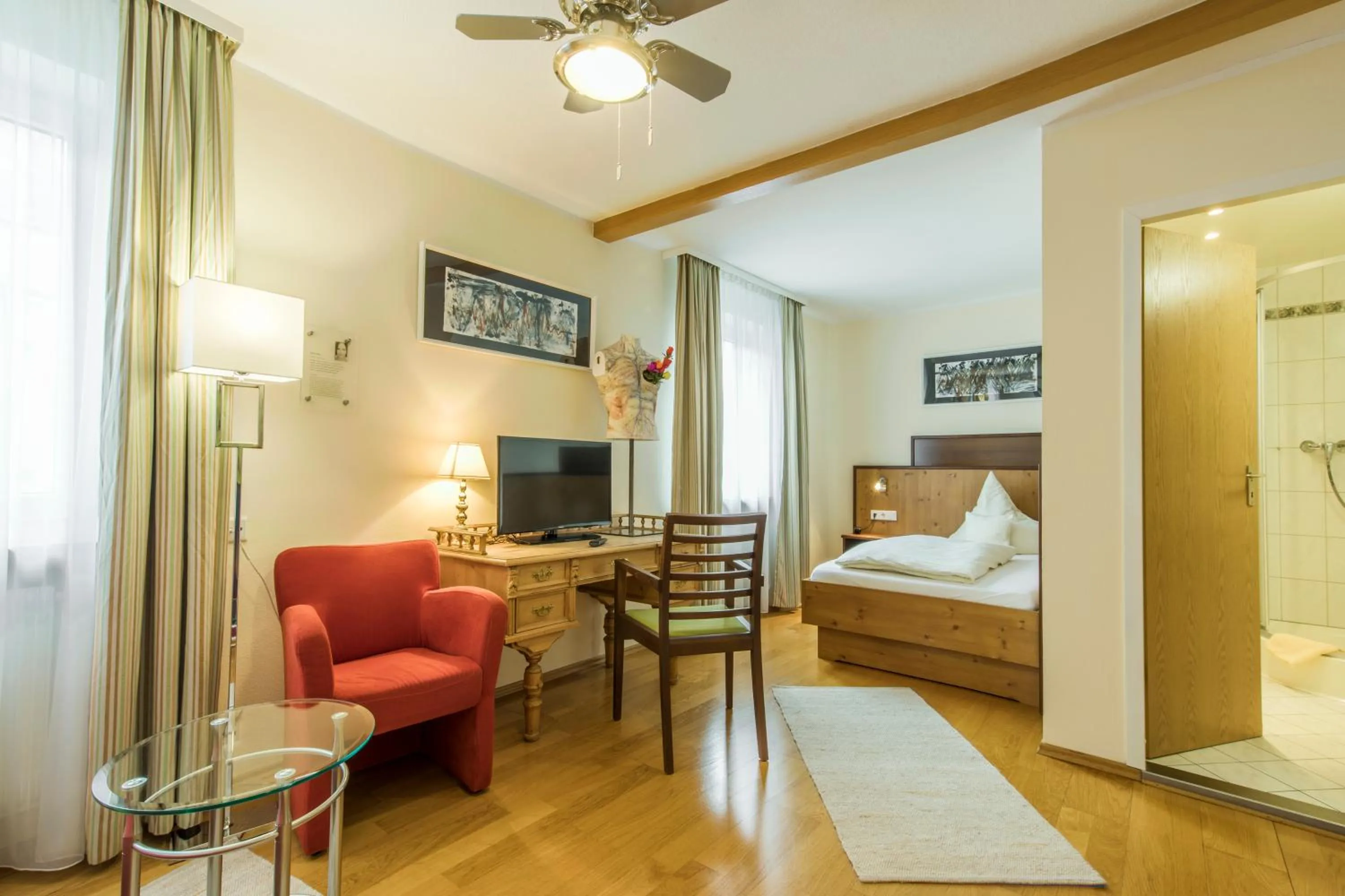 Bathroom, Bed in Hotel Brunner