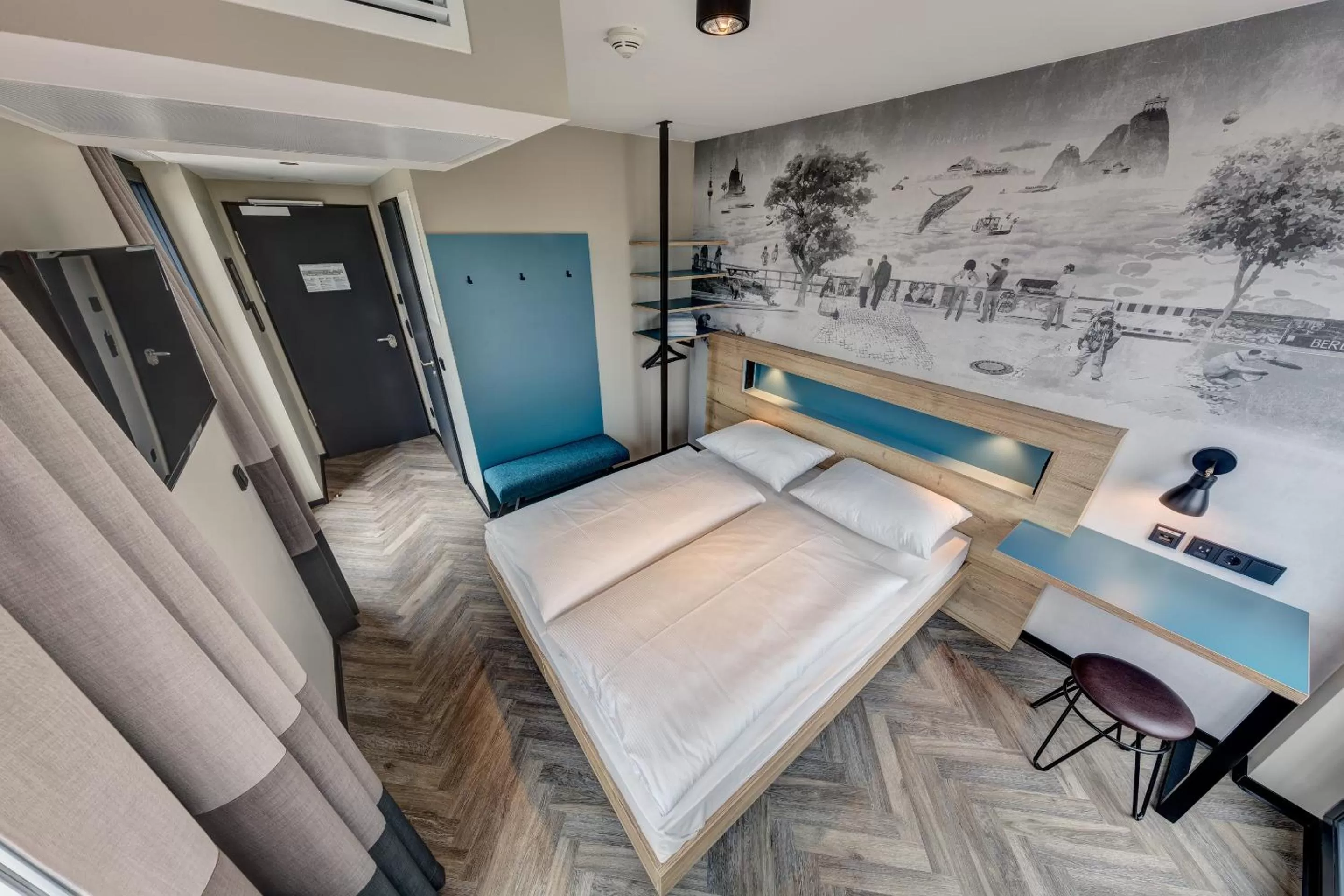 Bed in Schulz Hotel Berlin Wall at the East Side Gallery