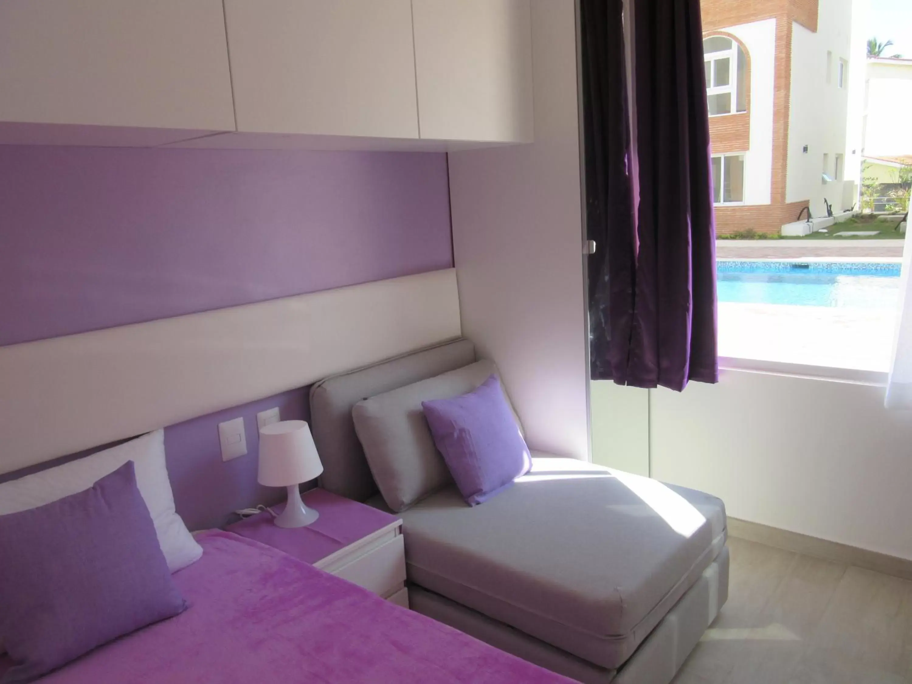 Presidential Deluxe Suite with patio & pool view and access (ground floor) in Coral Village - "Caribbean Cocktails" Deluxe Suites & Pool Presidential Deluxe Suite with patio & pool view and access (ground floor) in Coral Village - "Caribbean Cocktails" Deluxe Suites & Pool