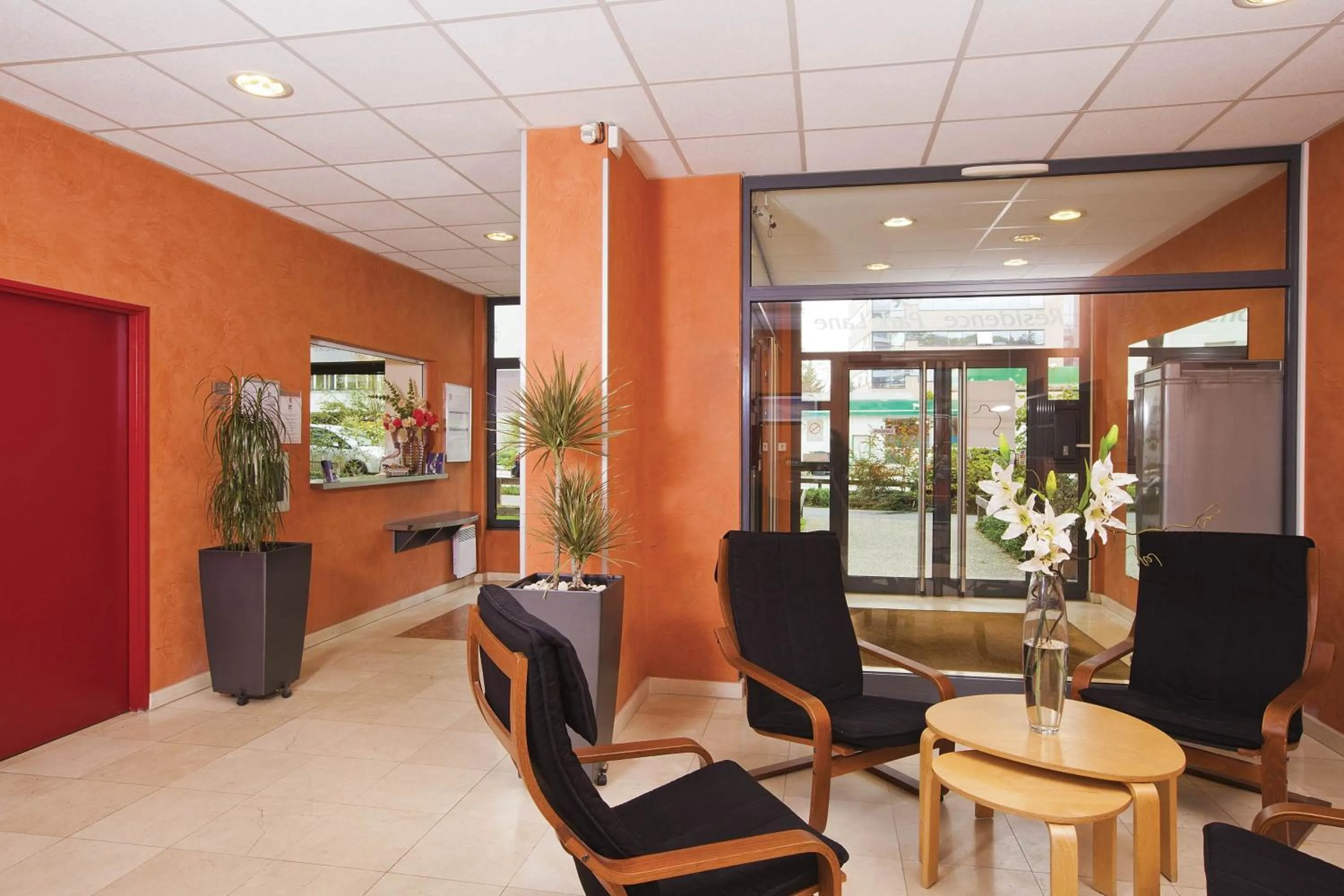 Lobby or reception in Séjours & Affaires Lyon Park Lane